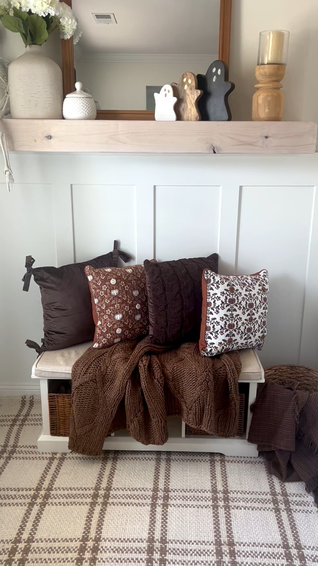 Fall entryway 
Brown velvet cable knit pillows
Fall pumpkin pillow
Brown throw blanket 
