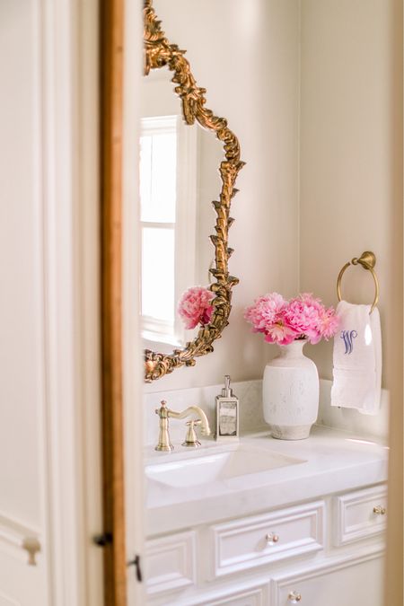 Ornate gold antique aged mirrors and widespread faucets 

#LTKhome #LTKstyletip #LTKFind