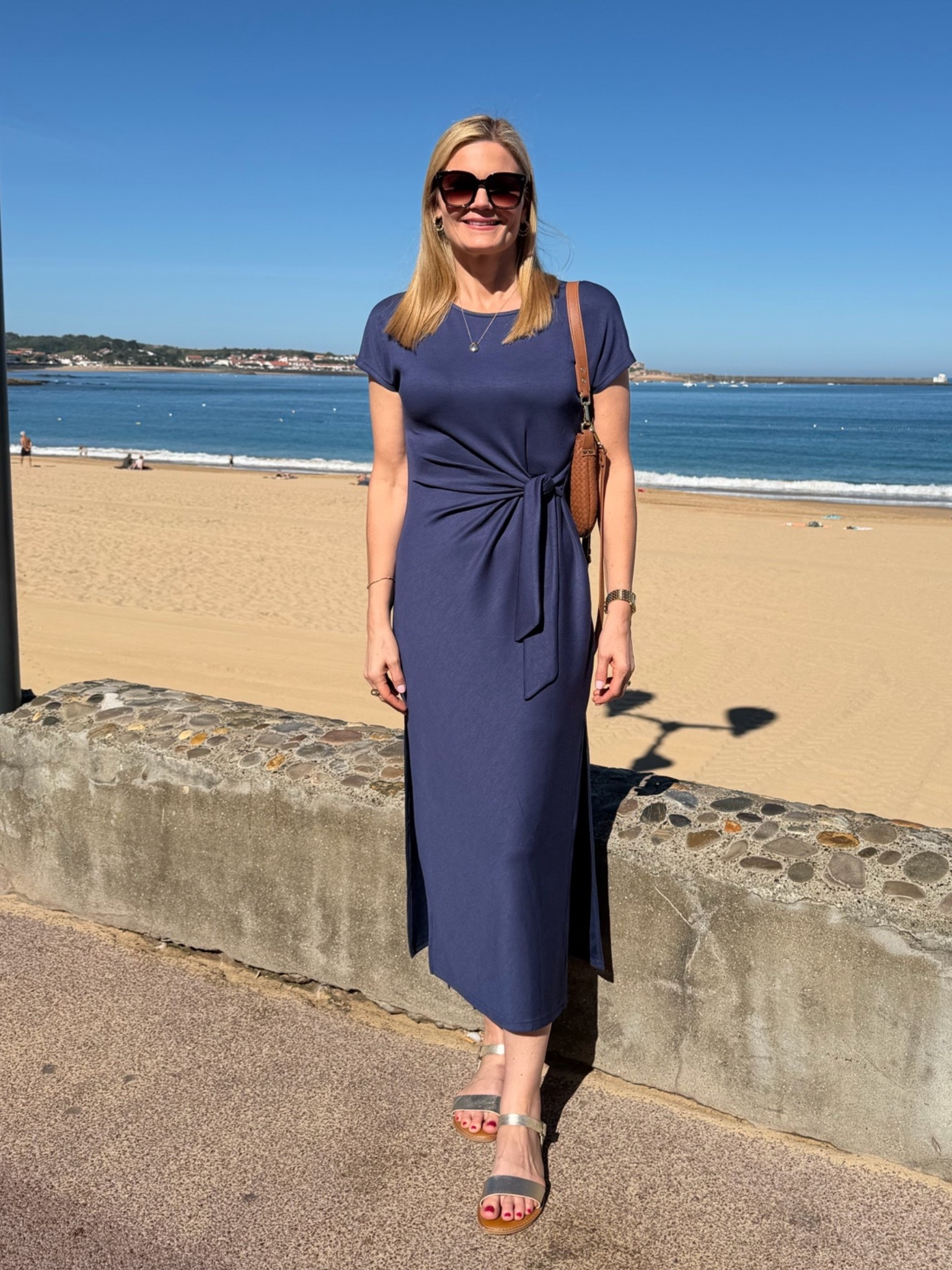 What I wore for travel in Spain and France! Tie waist dress is wrinkle-resistant. Wearing size small, fits TTS.

#LTKootd #LTKOver40 #LTKTravel