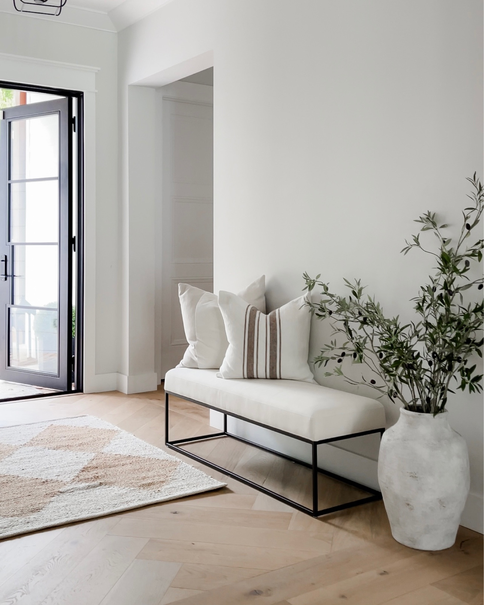 Entryway bench styling! 
Bench, pillows, rug
