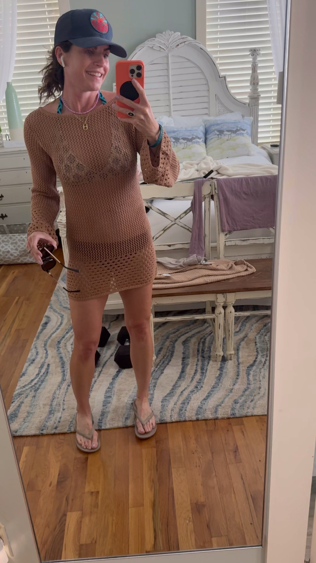 Love a long sleeve cover up to cover my shoulders and arms from the sun, wearing a small but wish I got a medium. Size up. 

Just bought these bottoms in navy and black and pairing with all my old bikini tops. Love this booty coverage amount. Wearing a medium so size up one on bottoms too! 

These Archie’s flip flops are arch supported and so comfy for an all day flip flop. Size up if between sizes  

#LTKSeasonal #LTKOver40 #LTKSwim