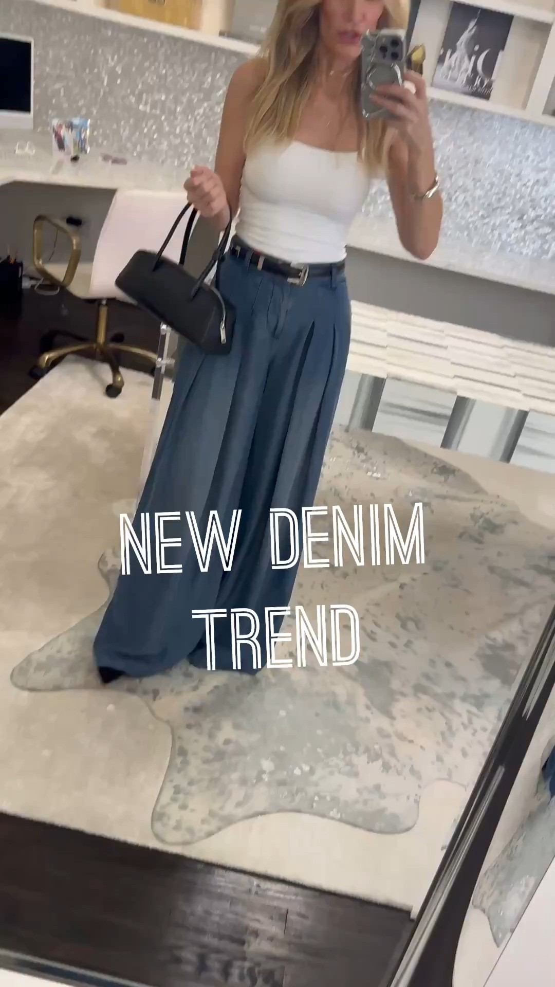Are your jeans aging your style? Try this denim trend instead. ✨ These wide-leg denim trouser jeans by Alice + Olivia are everything. They’re lightweight, incredibly comfortable, and the high-waisted, wide-leg silhouette is so flattering. For summer, I paired them with this chic white halter top from Aritzia for an effortless, elevated look. Then when fall arrives, just throw on a black leather jacket and you’ve got an outfit that feels modern, polished, and put together. Bonus: they have pockets (always a win 🙌) and they’re super comfortable too. Fit details: Wearing a size 24 in the jeans and an XS in the top. Both run true to size. Would you wear denim trousers? Let me know in the comments! 

 

#LTKootd #LTKgrwm #LTKOver40