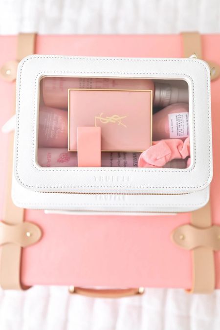 Pink and white travel accessories. Vintage luggage, white travel case, pink cosmetics, YSL, Glowy skin, innisfree, Korean beauty, k-beauty, DryBar prep rally spray. Detangler  

#LTKbeauty #LTKstyletip #LTKtravel