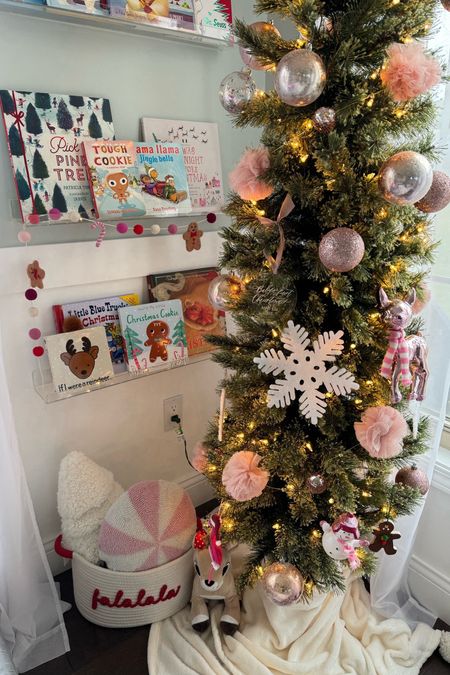Playroom christmas tree // playroom Christmas decor // toddler girl // playroom bookshelf // christmas books 

#LTKhome #LTKHoliday #LTKkids