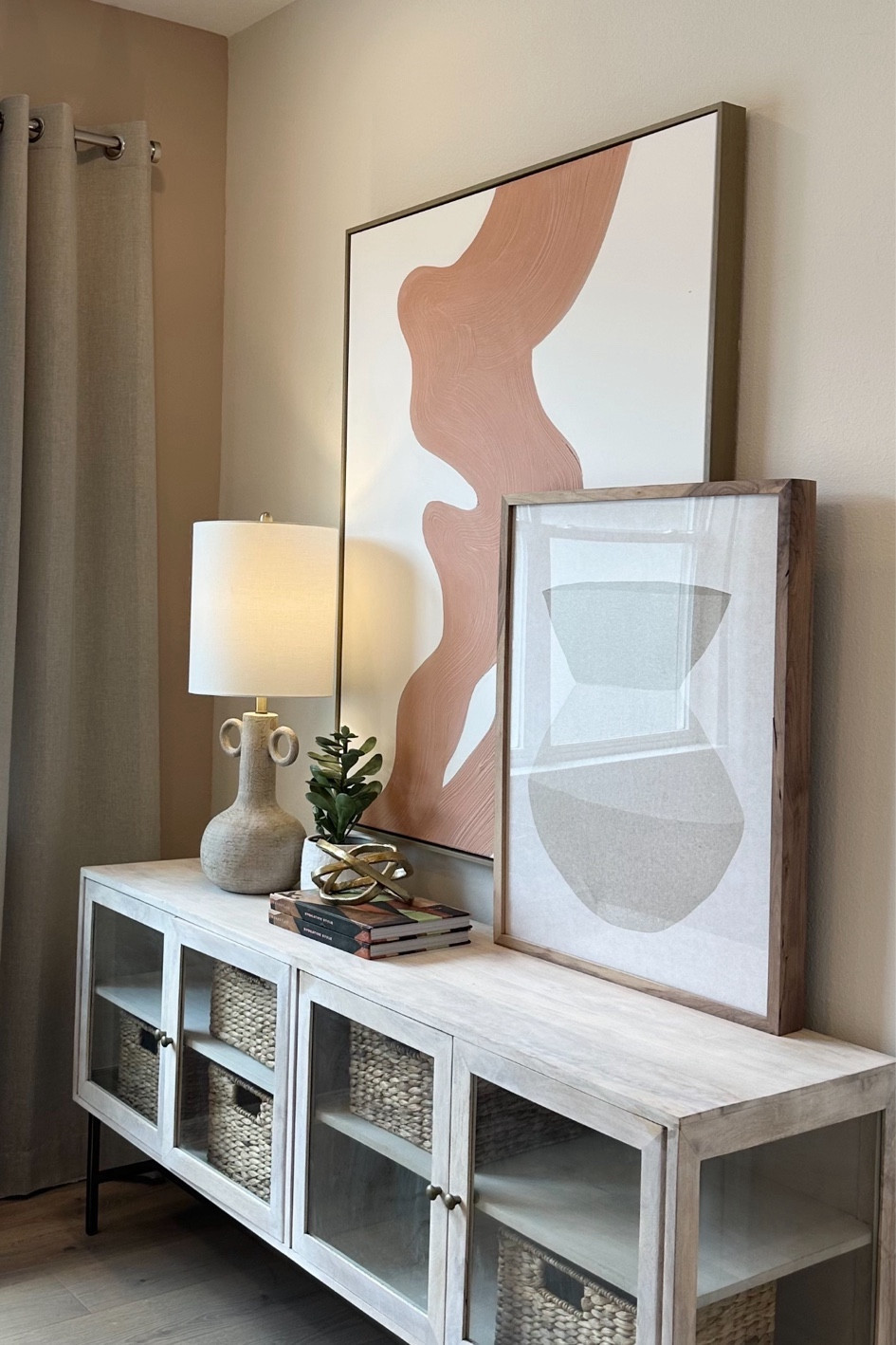 Modern Organic layered design perfect for an office, bedroom or living room.  Simple design with wall art, decor on a rustic cabinetts

#LTKstyletip #LTKhome