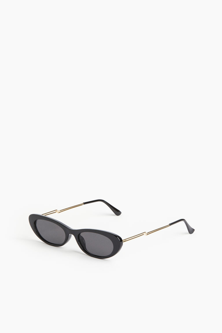 H & M - Narrow cat-eye sunglasses - Black | H&M (UK, MY, IN, SG, PH, TW, HK)