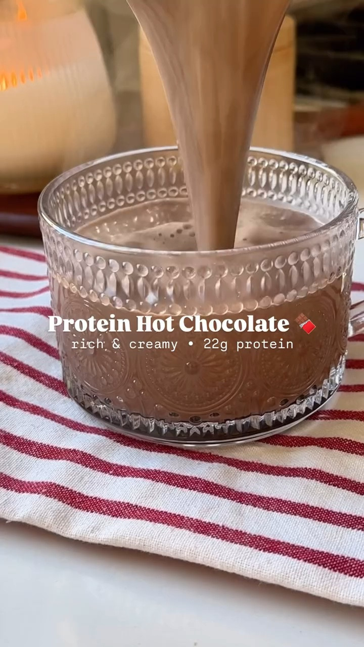 PROTEIN HOT CHOCOLATE! 🍫☕️

I can’t bring myself to try bone broth hot chocolate 😅 so this is what I make instead! Not only is it rich and creamy, but it’s packed with over 22 grams of protein. It’s the perfect option when I want something warm and cozy that has just as much protein as a protein shake.

Here’s how to make it:
・1 ½ cups (12 oz) non-dairy milk, I used almond milk
・1 Tbsp unsweetened cocoa powder or cacao powder
・1 scoop chocolate protein powder, I used Truvani
・1 Tbsp pure maple syrup, optional
・¼ tsp vanilla extract
・pinch sea salt

1️⃣ Add all your ingredients to a blender (or blender bottle) and blend or shake until combined.
2️⃣ Pour mixture into a small saucepan. Heat on low heat until just simmering, about 4-5 minutes.
3️⃣ Pour into a mug or heat-safe glass, top with your favorite toppings and enjoy!

#ProteinHotChocolate #HealthyBeverages #WinterDrinks #HighProtein #ProteinBoost #HealthyTreats #WarmAndProteinPacked #FitnessFuel #BeverageRecipes #ProteinRecipes

#LTKFitness #LTKSeasonal #LTKHome