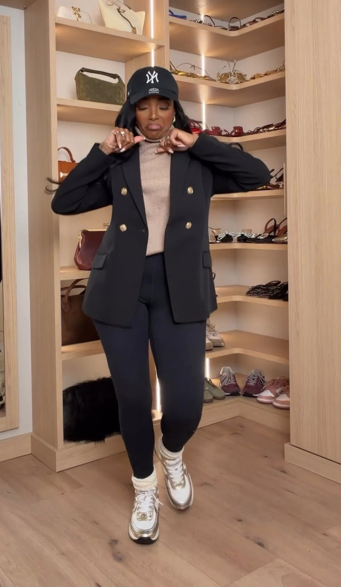Sporty chic, but make it elevated! 🖤✨

Who says leggings can't look dressed up? A classic black blazer with gold buttons, a neutral turtleneck, sleek black leggings, and statement sneakers creates the perfect mix of polished and casual. Add a baseball cap for that effortless cool-girl vibe! Perfect for errands, travel days, or a casual weekend look.

Everything is linked below! 🛍️

5'4" | 140 lbs | 34D | 27" waist | 40" hips

Download the FREE LTK app & follow me (@kirasfashionfinds) to shop the look!

blazer and leggings outfit, sporty chic outfits, black blazer outfit, elevated athleisure, casual fall outfits, sneakers with blazer, chic mom outfits, airport outfit ideas, baseball cap outfit, effortless street style