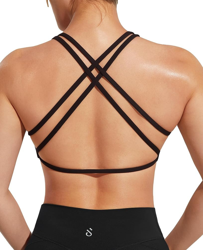 JOYSPELS Workout Sports Bra for Women, Criss Cross Back Strappy Fitness Casual Crop Tops with Rem... | Amazon (US)