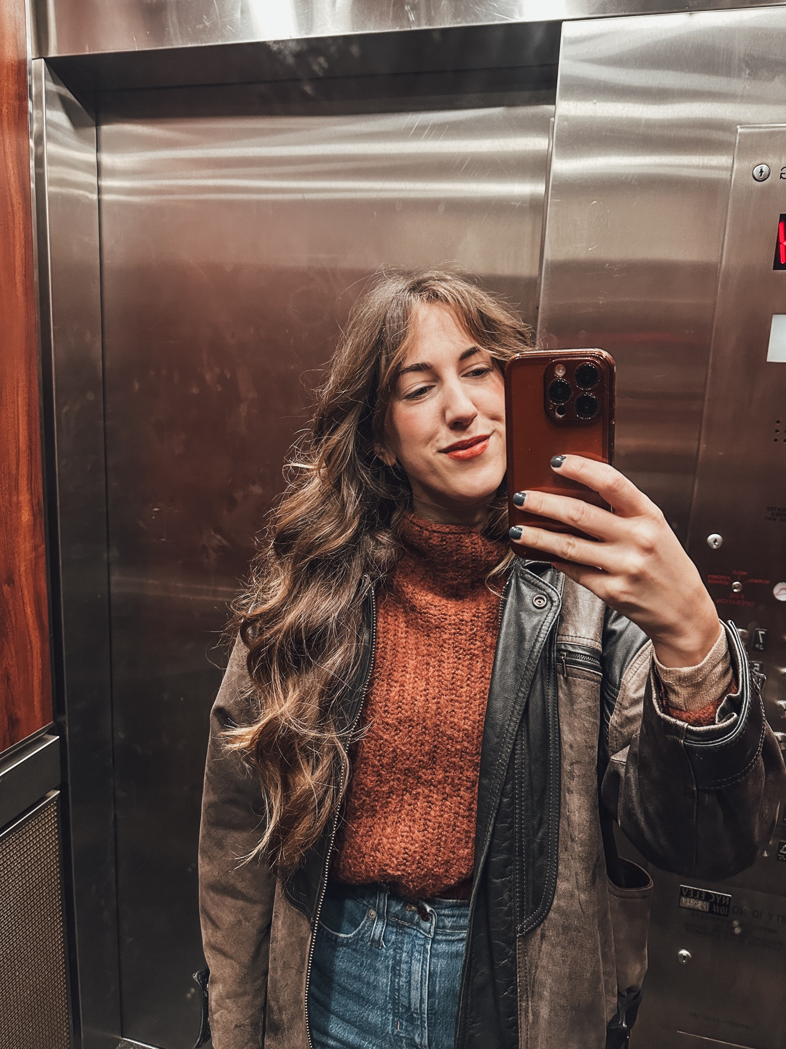 Cozy rust colored knit sweater paired with mom’s leather jacket from the 80’s makes for a great elevator selfie 🤳 

#LTKstyletip
