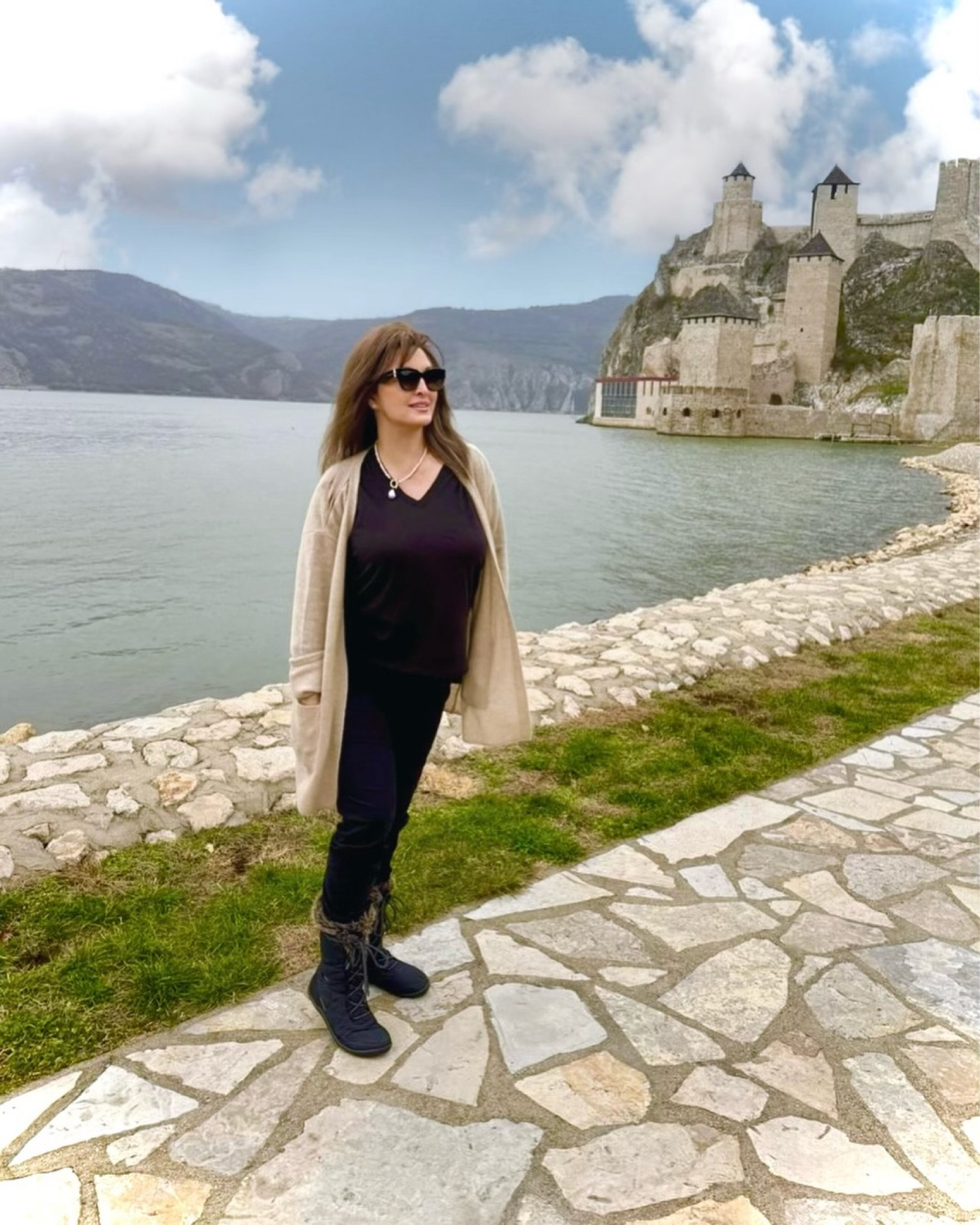 Discovering the ancient Golubac Fortress, just a few steps off the @AmaWaterways AmaMagna’s dock!  See the medieval stronghold dating back to the 14th century. This fortress has witnessed centuries of power struggles along the Danube, held by empires including the Serbian Despotate, the Ottoman Empire, and the Habsburg Monarchy. Its strategic location at the entrance to the Iron Gates Gorge made it a prized possession for controlling river trade and defending territories. Today, Golubac stands as a stunning reminder of Serbia’s rich history and the empires that once vied for control of this iconic landmark.

#heartoftheriver #AmaWaterways #rivercruise #europe #europetravel #luxurytravel

📸 @miabingenheimer 
🧥 @frannegolde 
💎 @ahavajewels 
🕶️ @longchamp

#LTKHoliday #LTKGiftGuide #LTKCyberWeek