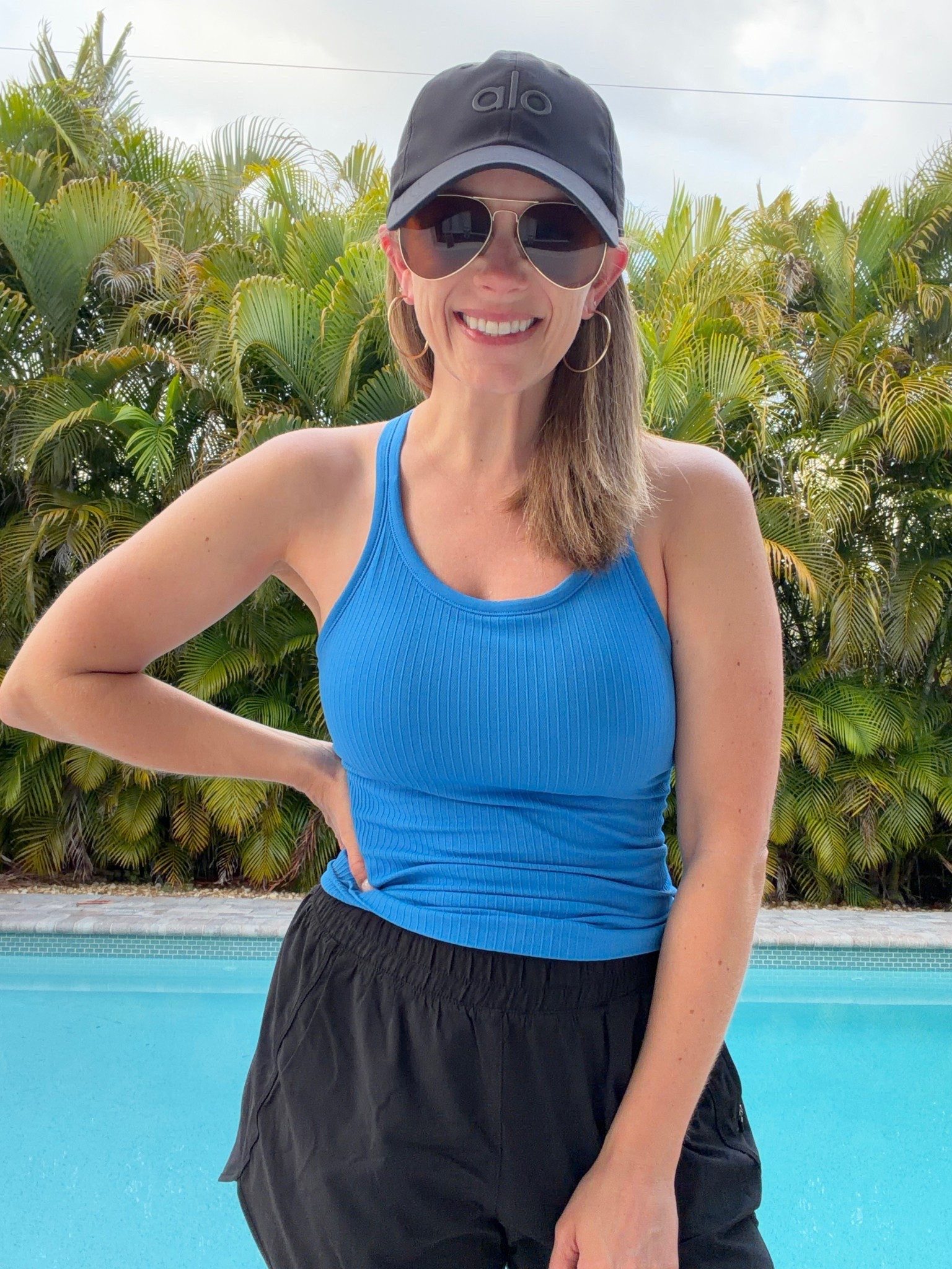 My favorite Amazon tank! And I love these shorts - I size up for a looser fit! 💙

#LTKTravel #LTKOver40 #LTKPetite
