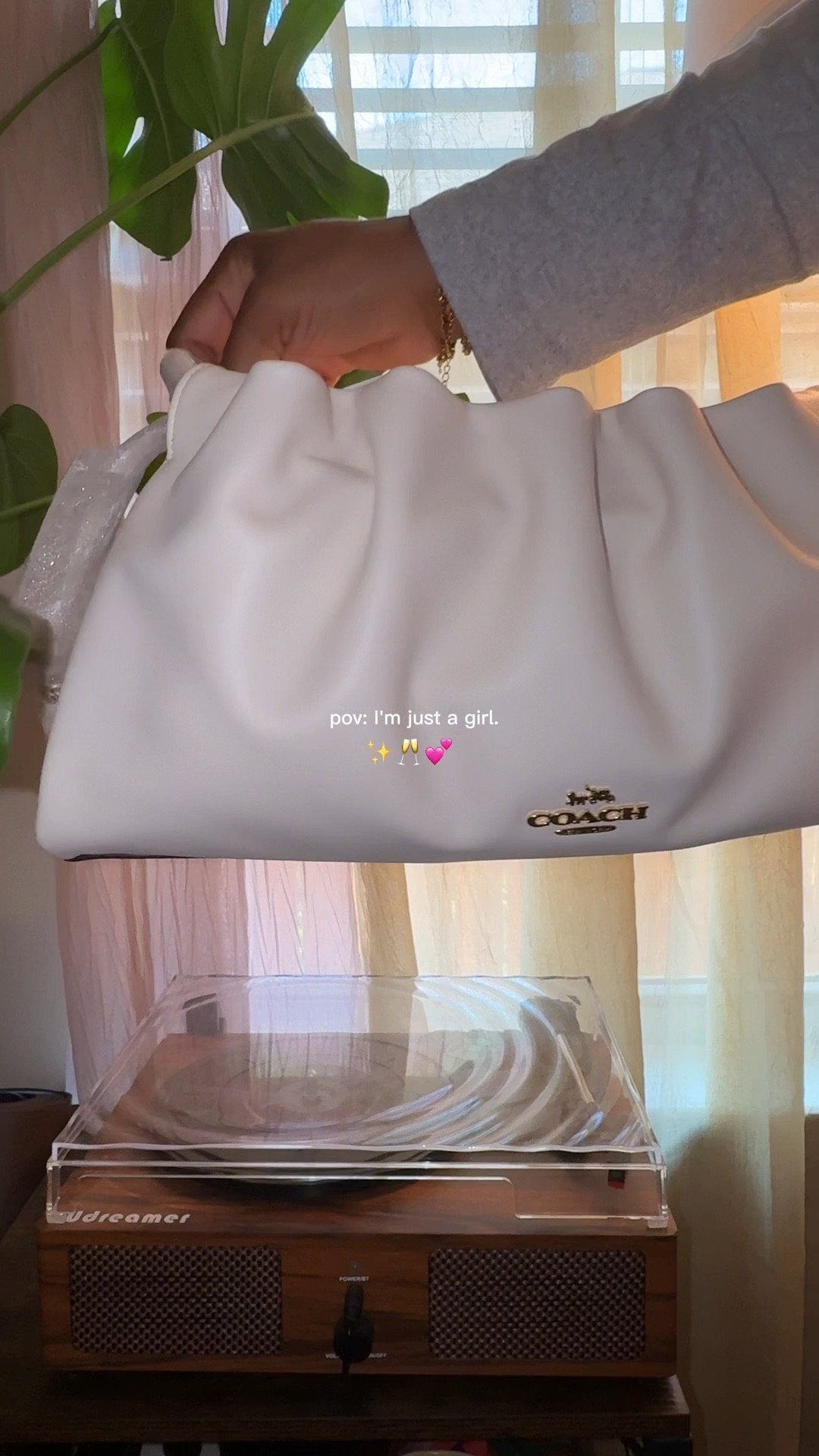 POV: I’m just a girl 💖🥂✨
I fell in love with this Faye bag last fall and had to have it as a bday gift to myself!
She’s the perfect go to with her 3-in-1 versatility 
🤍 Clutch
🩷 Gold chain 
🤍 Leather strap 
How would you rock it? 
#coach #handbags #giftideas 

#LTKmomlife #LTKMothersDay #LTKSaleAlert