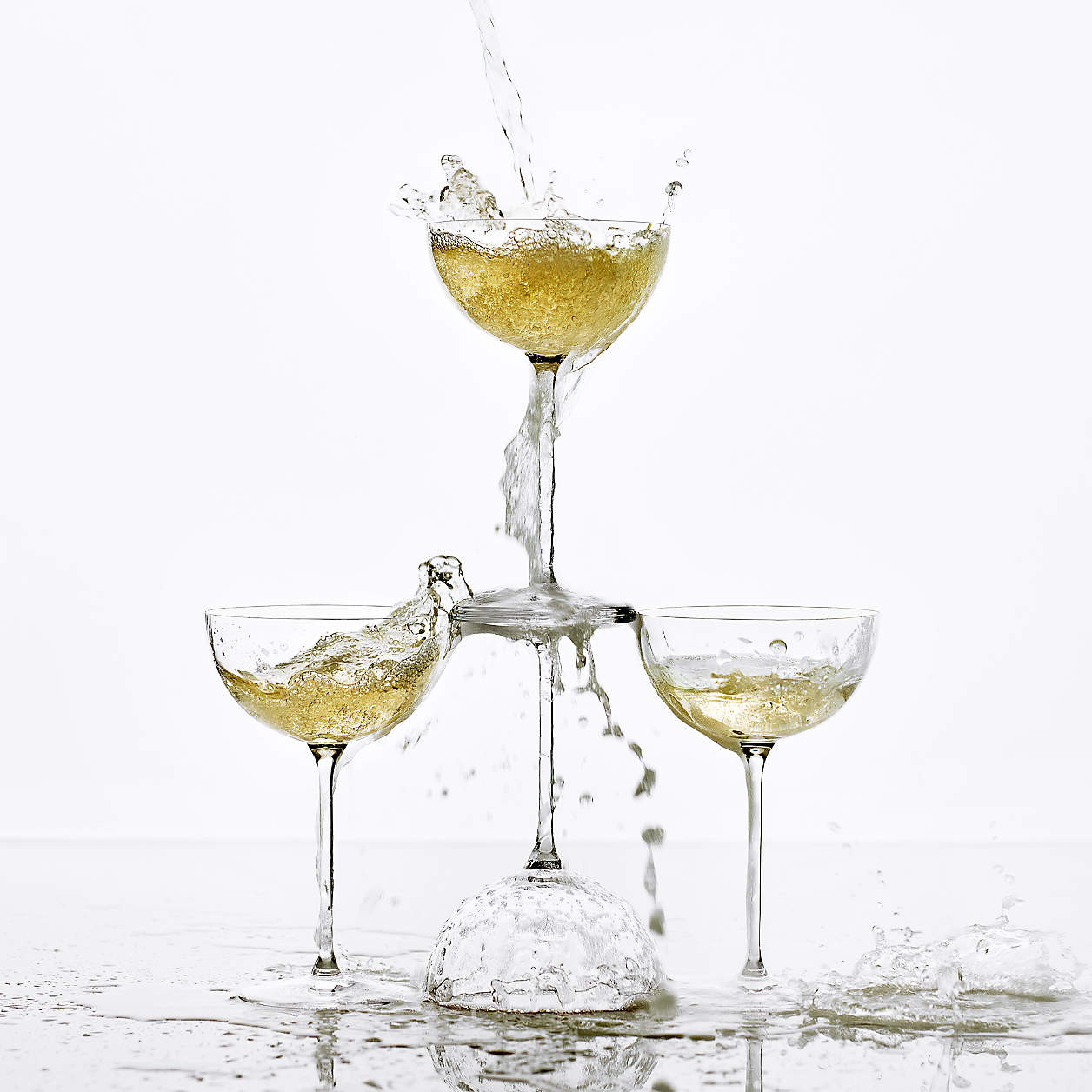 Camille 8-Oz. Long-Stem Champagne Coupe Glass + Reviews | Crate & Barrel | Crate & Barrel