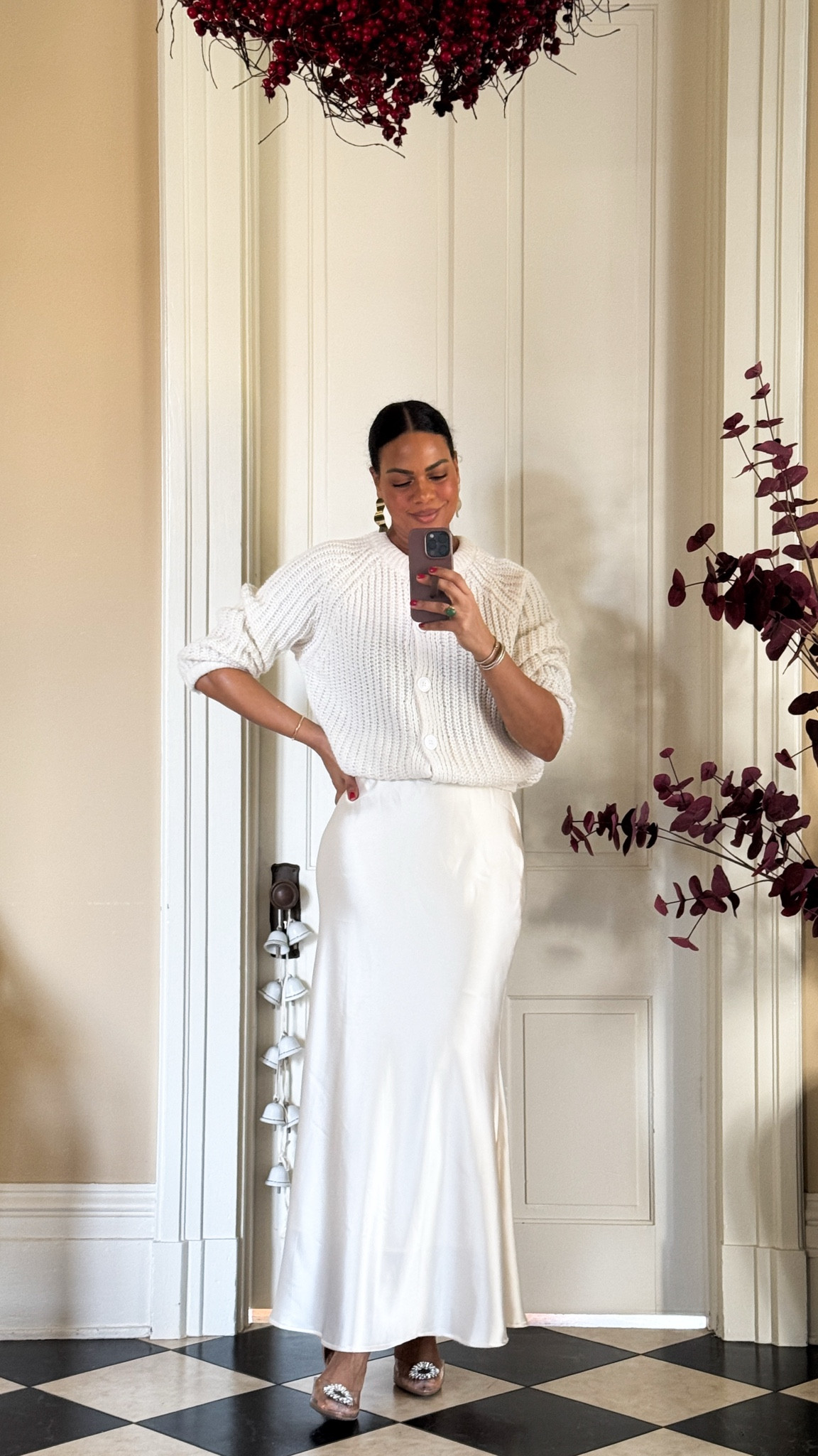 Holiday Outfit Idea from Amazon! This gorgeous satin skirt & cardigan is perfect for a Christmas party. Paired with gold jewelry & rhinestone heels. Sweater & skirt is color beige!

#LTKOver40 #LTKHoliday #LTKStyleTip