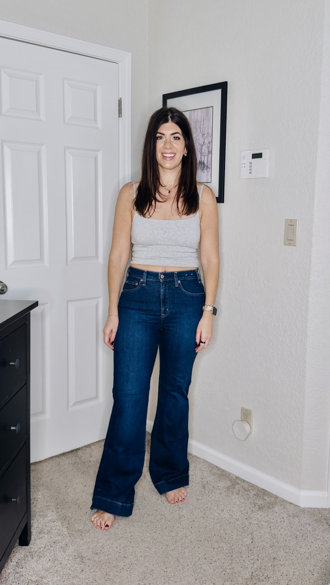 Favorite denim of 2025
In a medium tank and 29 long flare jeans 

#LTKTall #LTKOver40 #LTKMidsize