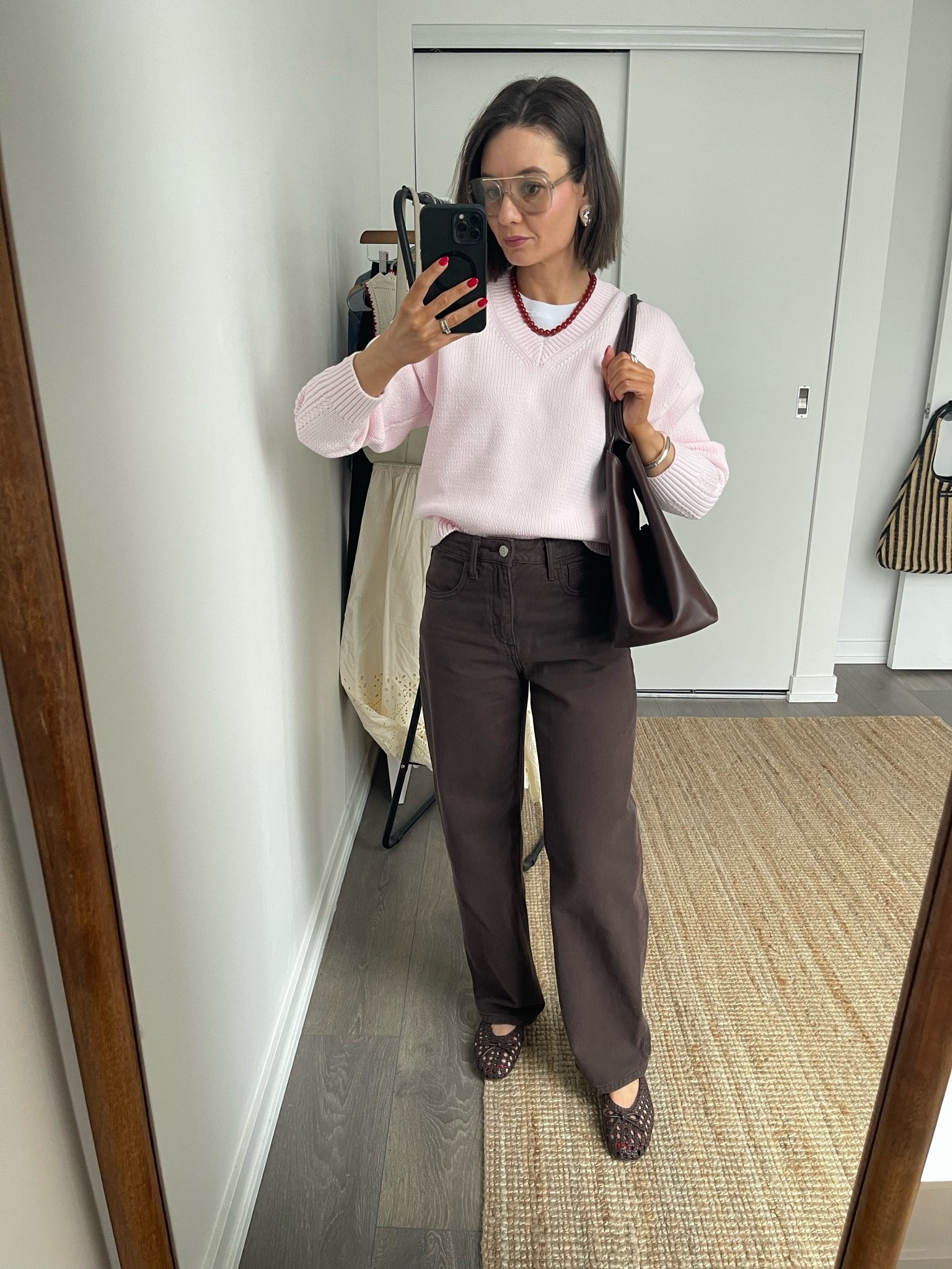 Loving this brown and punk combo! Sweater is in a size S. Jeans are size 2.