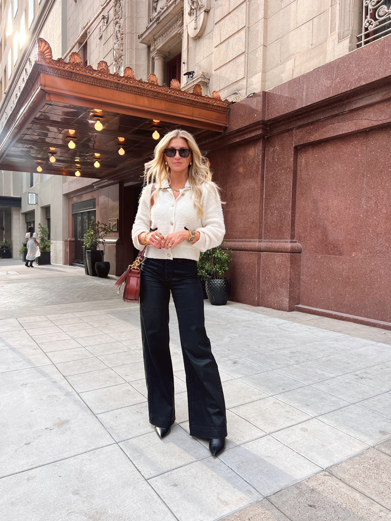 Cream cardigan and black coated wide leg denim for first day of 

#LTKstyletip #LTKCon