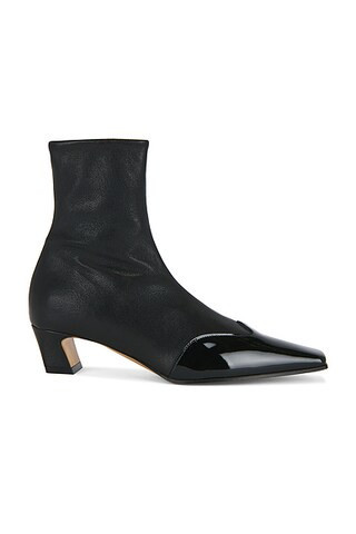 KHAITE Nevada Ankle Stretch Boot in Black - Black. Size 40 (also in 39, 39.5). | FWRD 