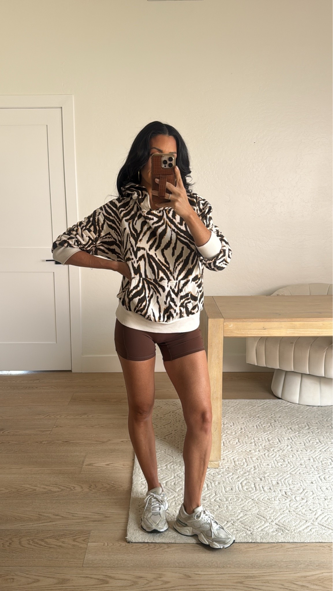 Walmart active outfit idea! Love this zebra print for fall 
Hoodie size small 
Active shorts size small 
New balance sneakers

#LTKxWalmart #LTKActive #LTKmorningroutine