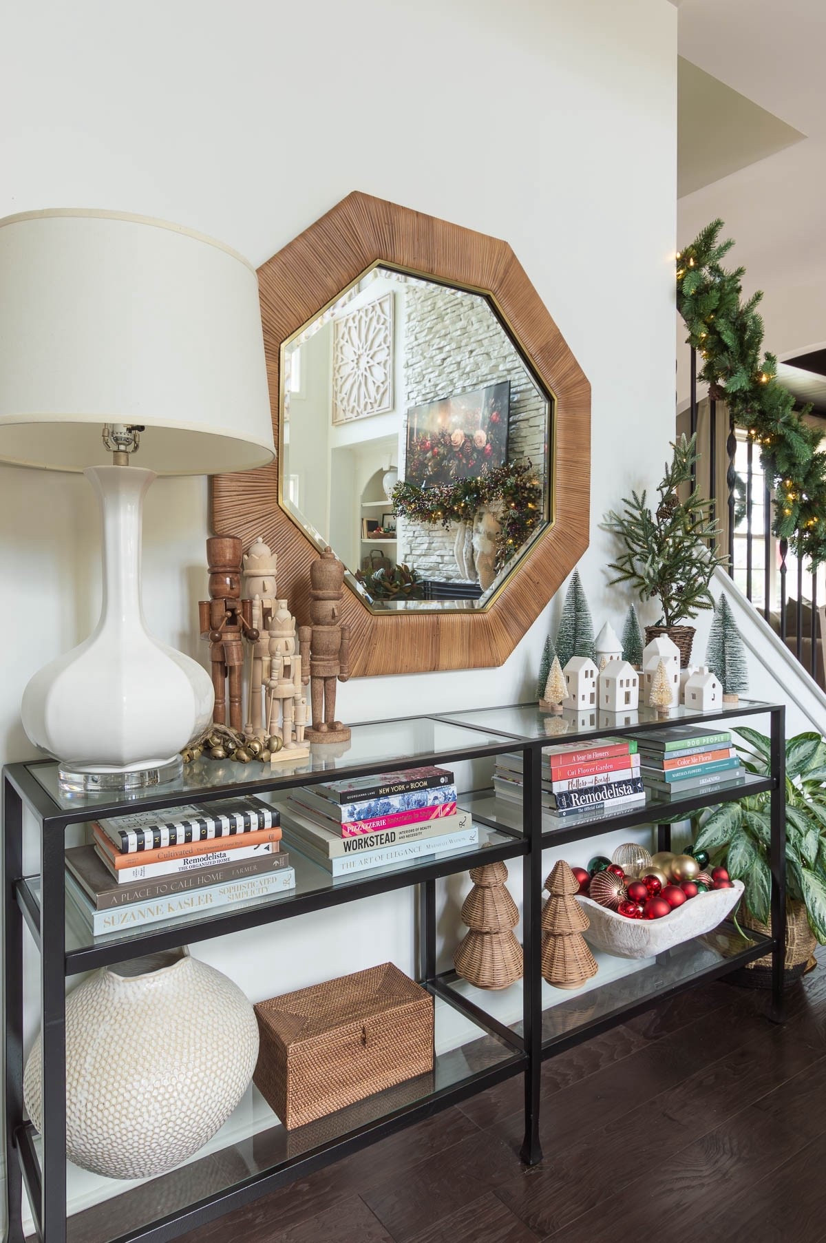 I like to get creative with different ways and locales and surfaces to showcase some of my Christmas collections, like these natural wood nutcrackers, mini village houses and small Christmas trees of several different types. My living room console table is ideal for styling during the holiday season. home decor living room decor Christmas decor rattan Christmas tree pre-lit pine tree natural nutcracker traditional Christmas large round vase

#LTKHoliday #LTKFindsUnder50 #LTKHome