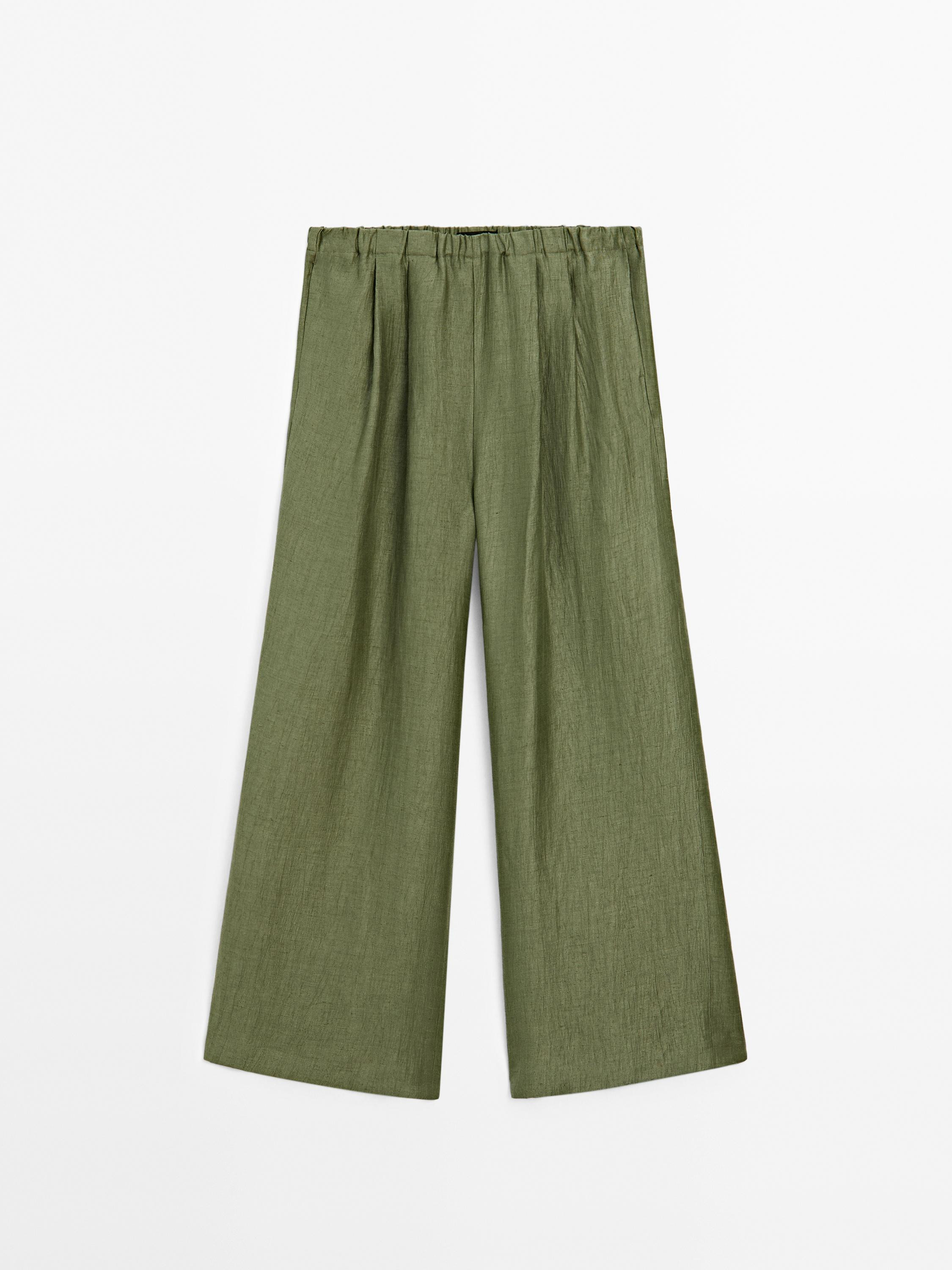 Trousers made of linen blend fabric. Elasticated waistband detail. Two side pockets. Matching gar... | Massimo Dutti US