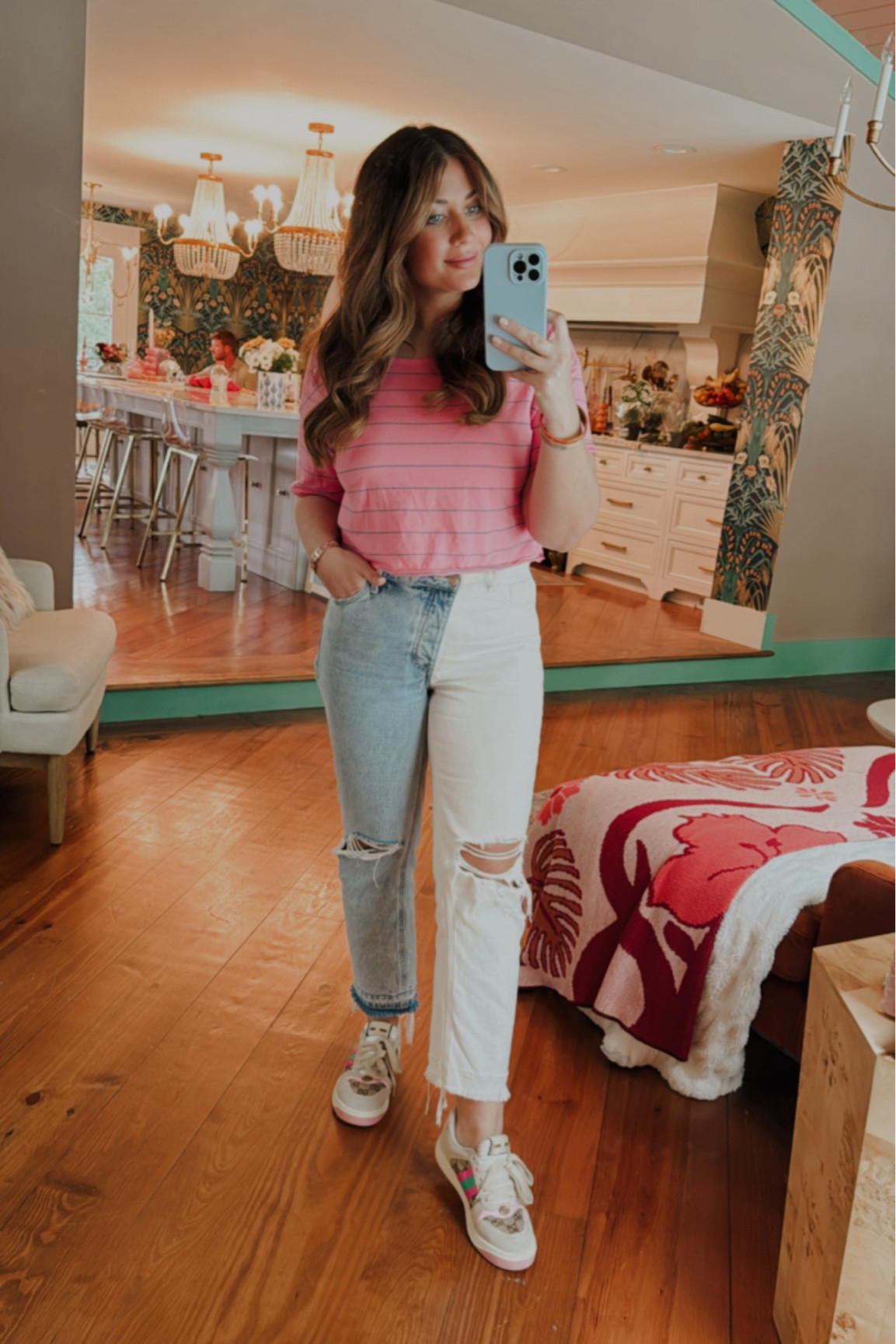 I’m wearing a medium in the shirt and 28 in the jeans!