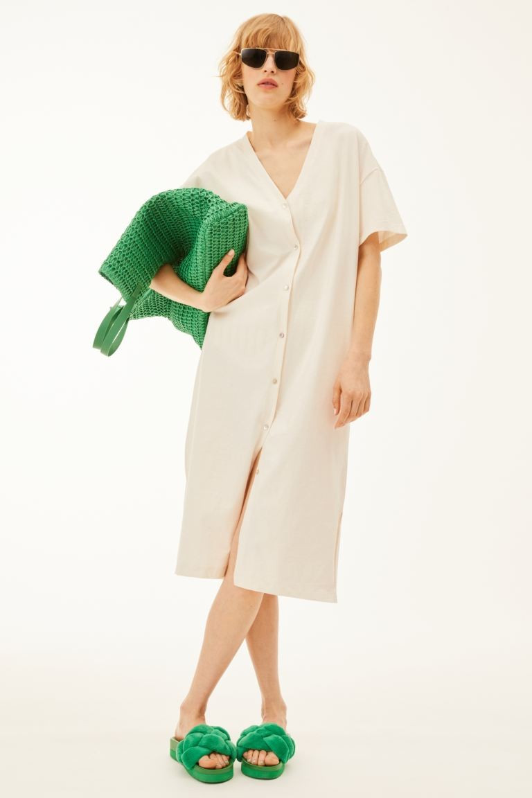 Straight-cut, relaxed-fit, calf-length dress in soft cotton jersey. V-neck, buttons full length o... | H&M (US + CA)