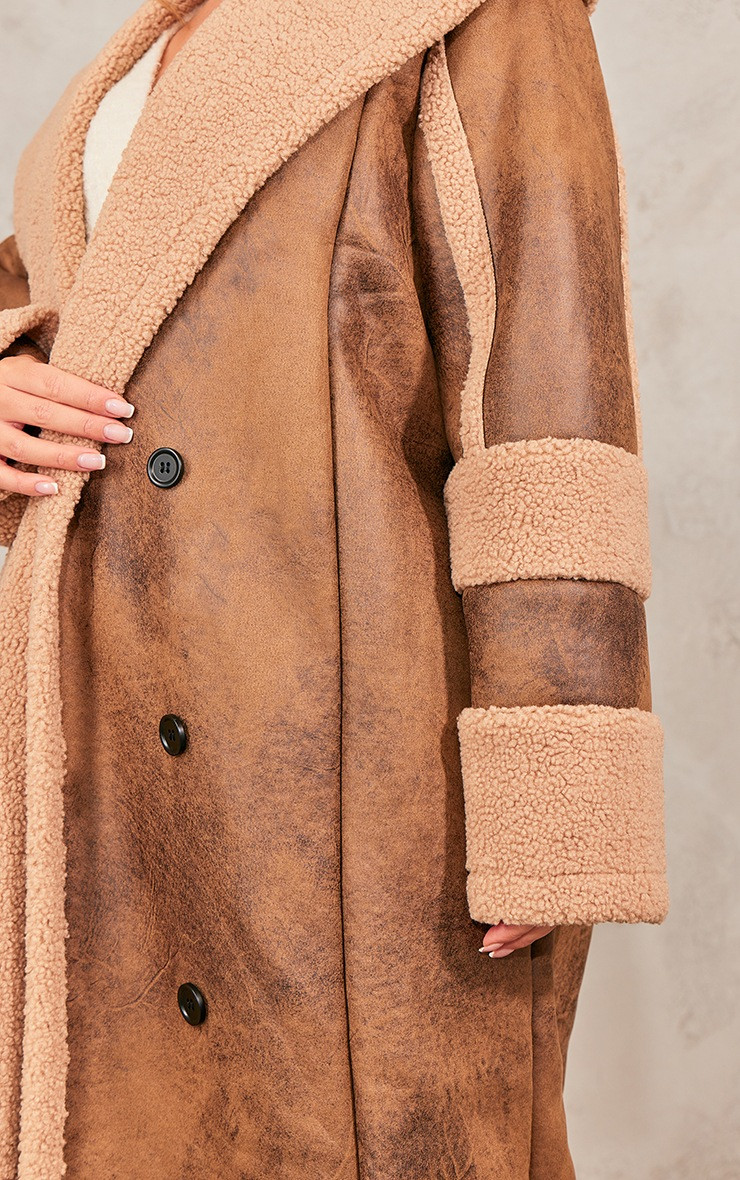 Brown Distressed Look Faux Leather Borg Lined Double Breasted Coat | PrettyLittleThing UK