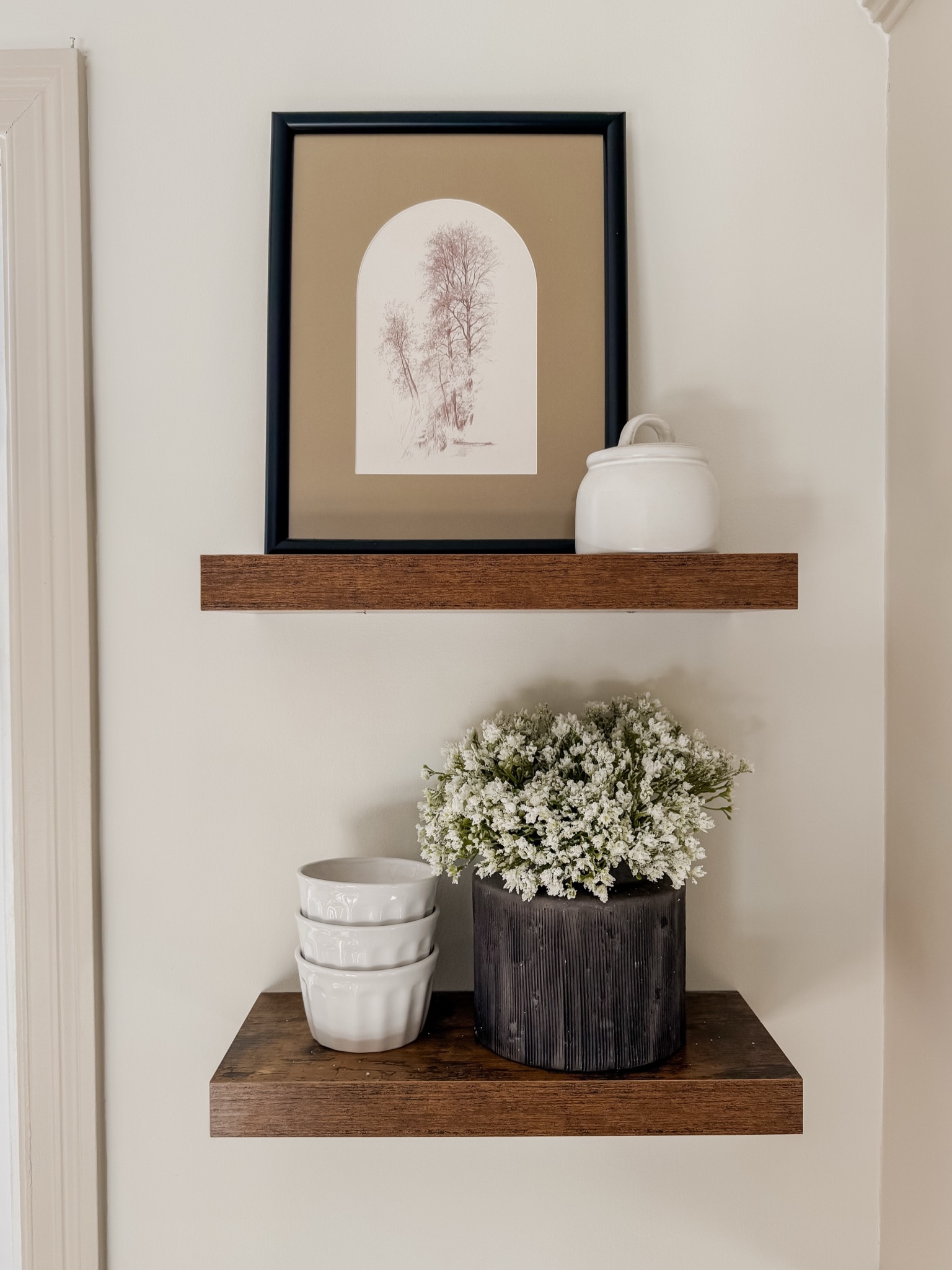 Shelf styling is by FAR the most brain-busting part of interior design, these short shelves don’t really allow for the “rule of three” so I played with different heights! 

#LTKHome #LTKFindsUnder50 #LTKSeasonal