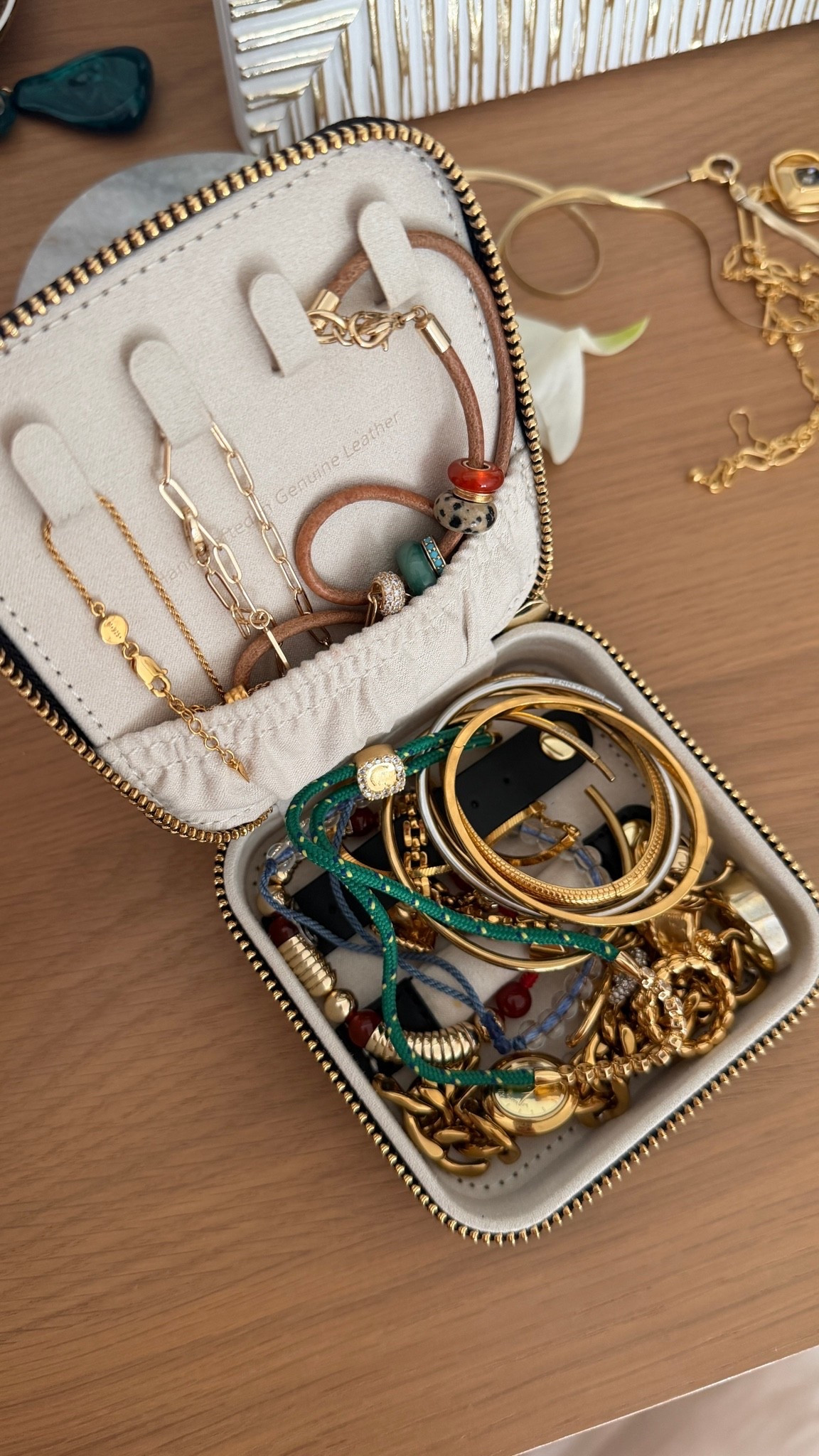 My travel jewelry case and the jewelry I brought with me for Switzerland. Most of it is waterproof so I went swimming in it!

#LTKgrwm #LTKTravel #LTKdayinmylife