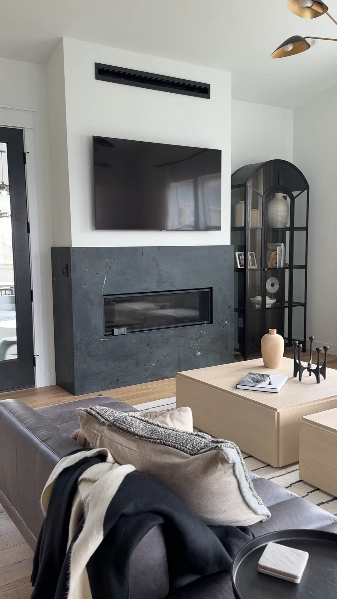 Living room details 

Coffee table 
Sofa
Rug
Hutch 
Modern 
Home Decor 

#LTKhome #LTKstyletip #LTKover40