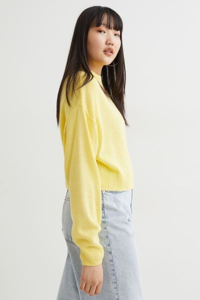 Soft, knit sweater with heavily dropped shoulders, extra-long sleeves, and ribbing at neckline, c... | H&M (US + CA)