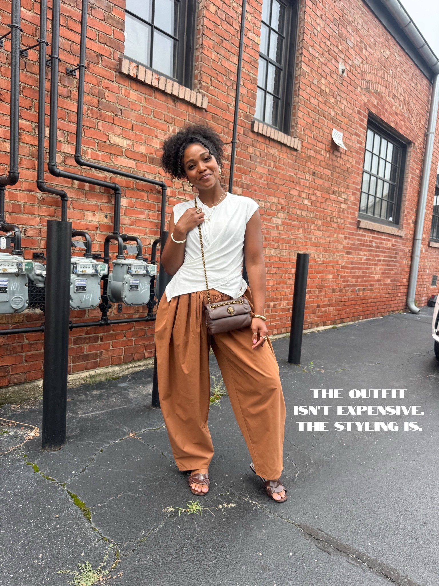 A designer bag can make a $40 outfit look like a $400 one. #jumpsuitoutfit #wearingvsstyling

#LTKgrwm #LTKootd