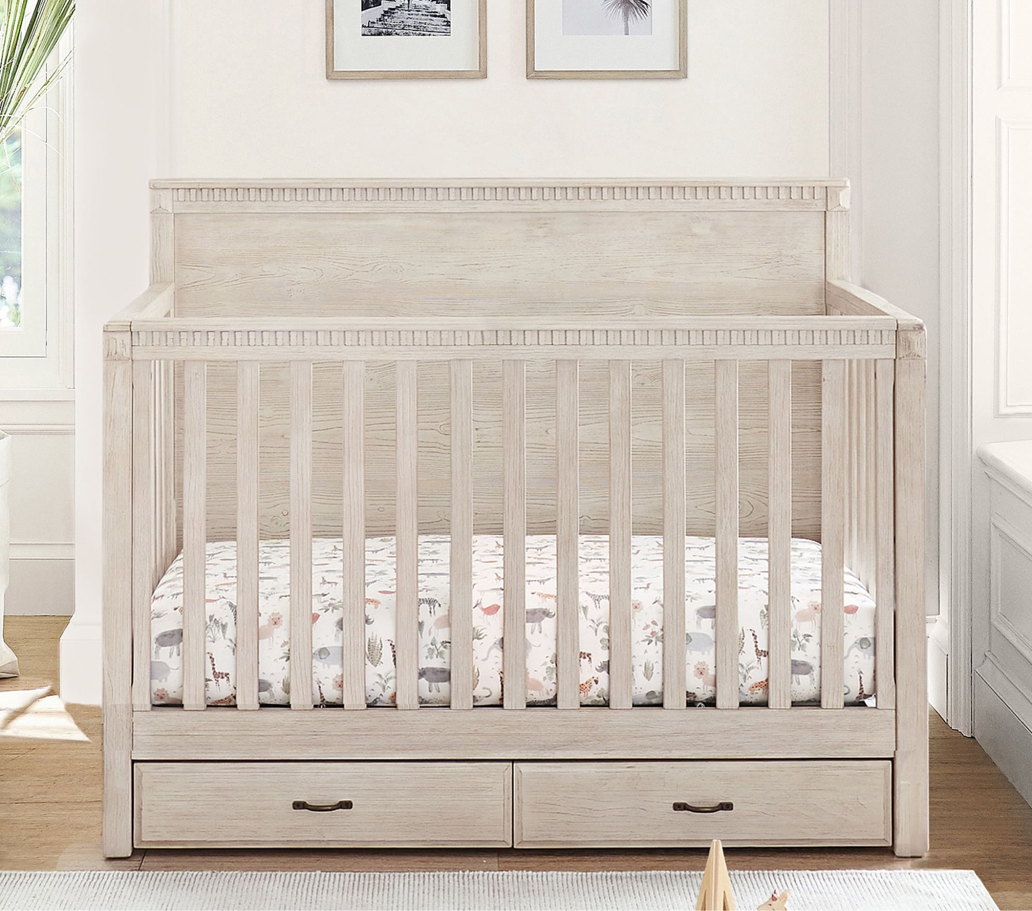 We love our Rory pottery barn convertible crib. Will convert to toddler bed eventually. It’s great having the extra drawers as well. 