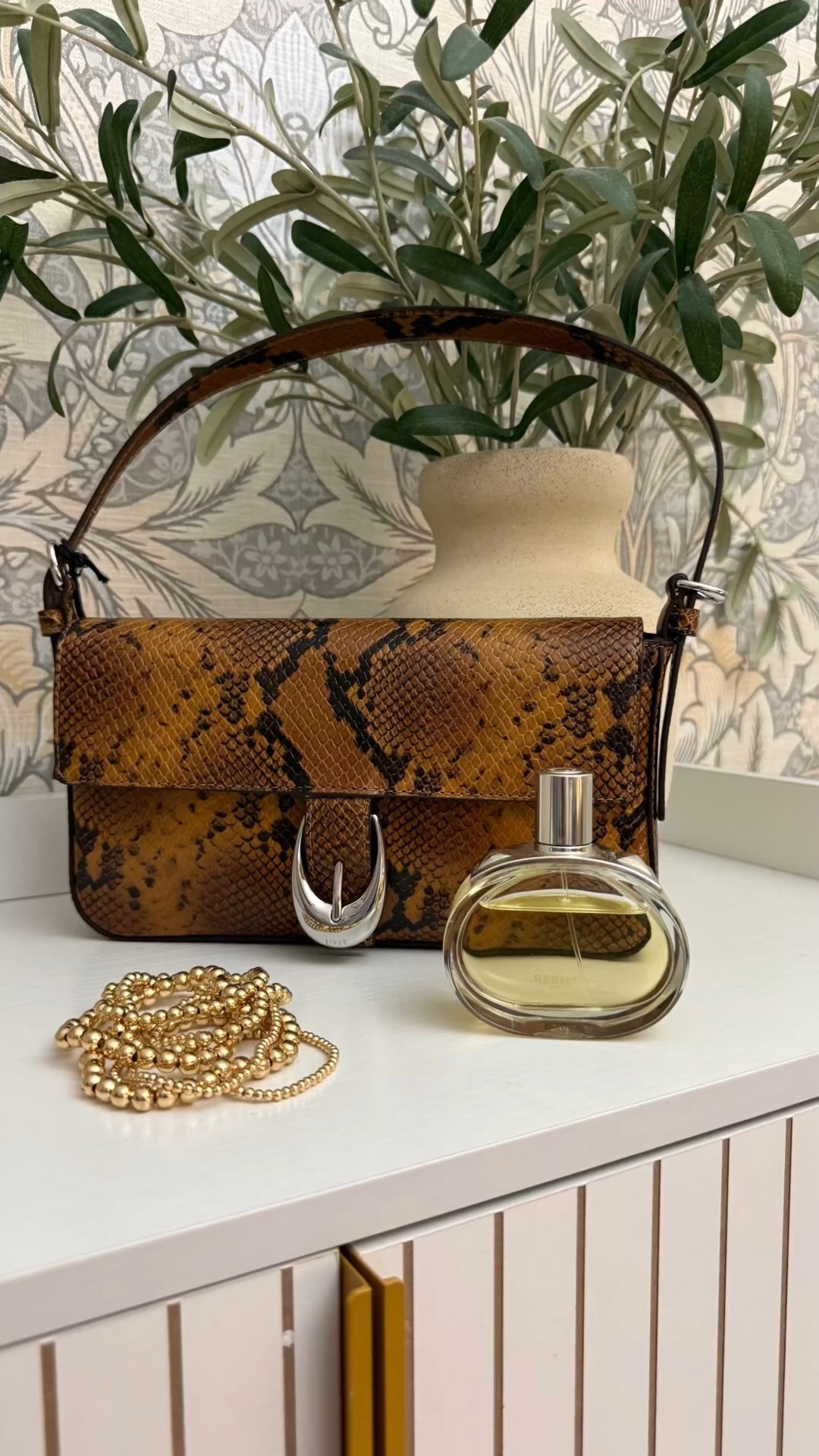 A few accessories I’ve been wearing lately.

Staud snakeskin print bag. Love the print- it's so versatile! 

Beaded bracelets by Alvara. Use code Sandy15 for 15% off your Alvara order.

Hermes Barenia.  ❤️ 

#LTKOver40 #LTKFindsUnder50 #LTKPetite