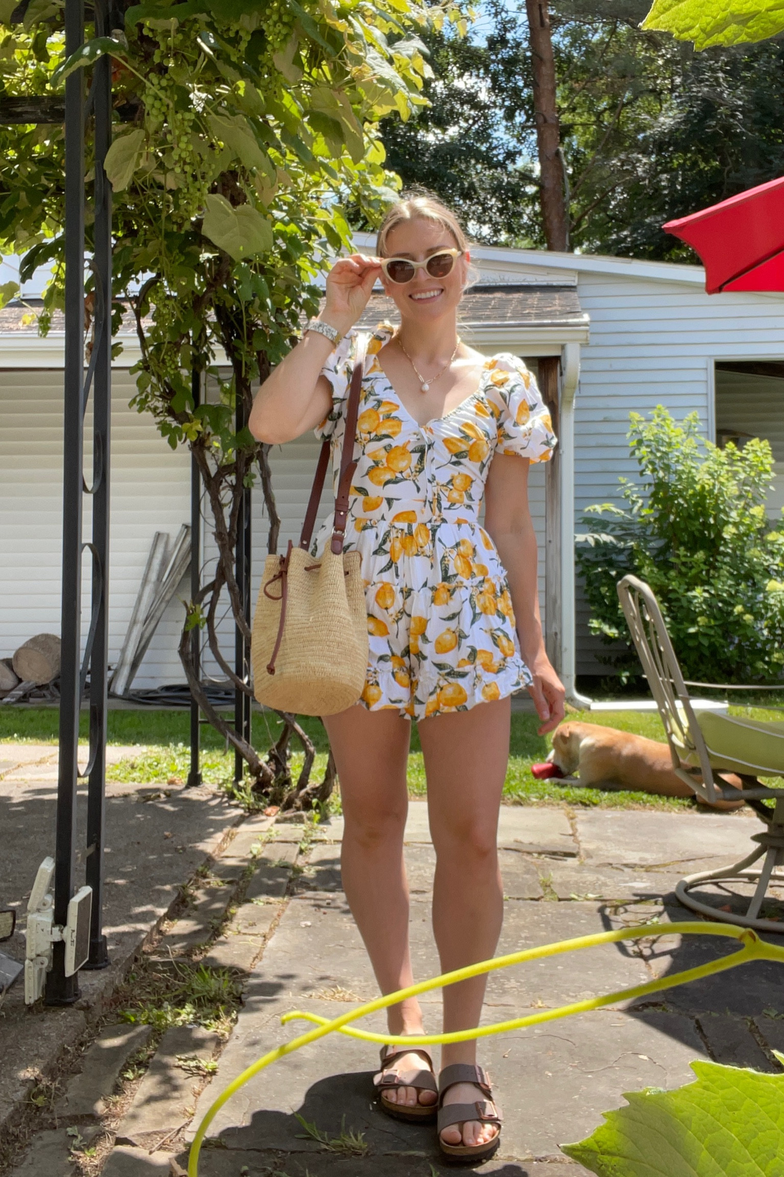 Summery ootd; I’ve had this basket bag for years and it’s held up so well! So cute and functional. These vintage style sunglasses are also a staple 

Birkenstock, slide sandals, summer accessories, summer bag, cat eye sunglasses, lemon print 

#LTKSeasonal #LTKItBag #LTKShoeCrush