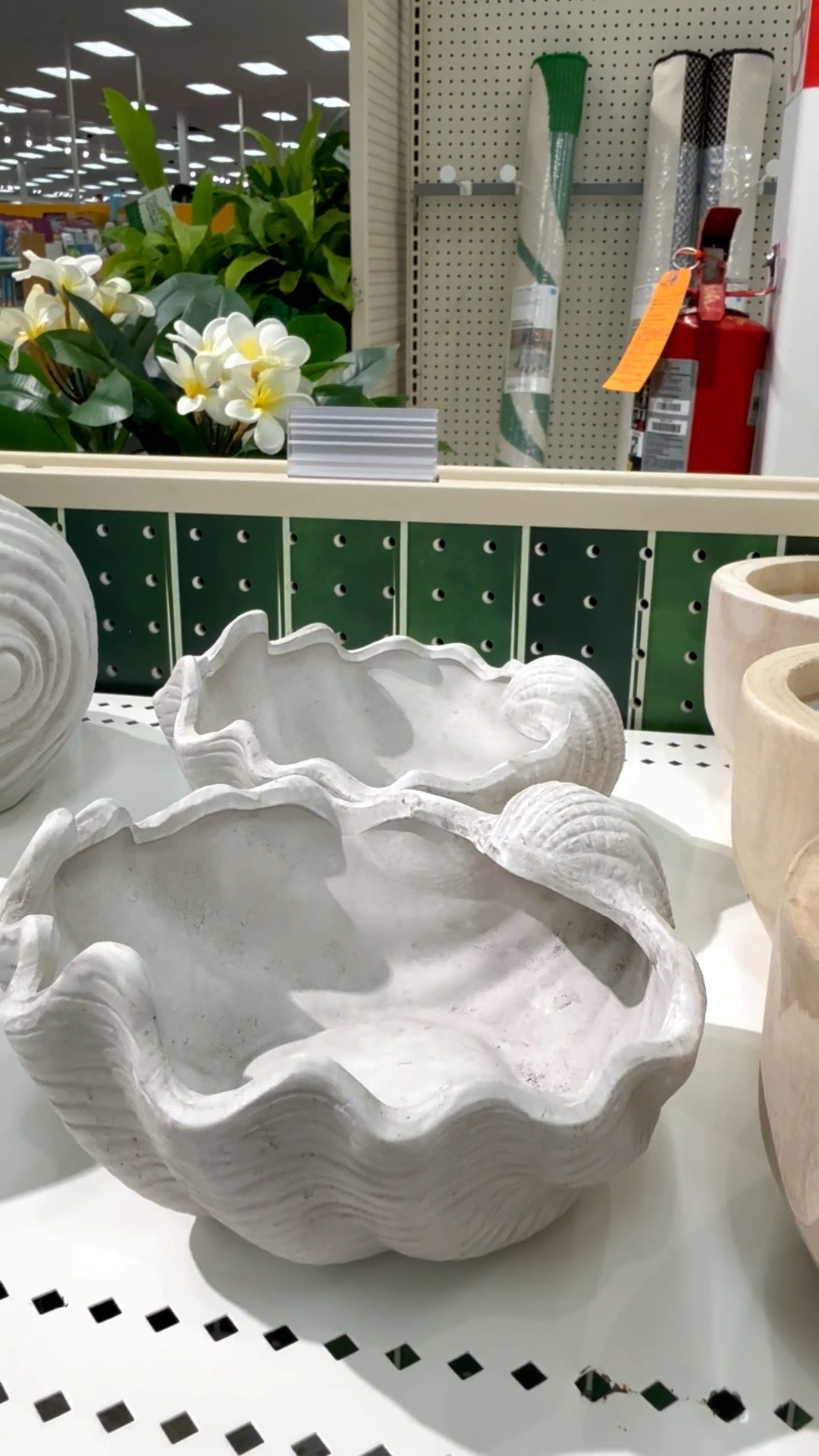 This ceramic shell planter is getting me so excited about the warmer weather months which means…outdoor entertaining, container gardening, and whimsical patio decor. 🐚

This adorable shell planter is perfect for faux or live plants (which don’t require much water). Tip: you can drill drainage holes in the bottom with a diamond drill bit. But this shell would also be cute for wrapped candy (I’m looking at you Hershey Kisses!✨), utensils, and bug repellant packets. Planter comes in two sizes.

If you’re a mosaic artist, this would also be a fun substrate for your tile work…whether you mosaic the inside, outside, or both! For mosaic tips, tutorials + inspiration please visit my YouTube channel: YouTube.com/julieweilbacher, and follow @julieweilbacher on Instagram.

#shellplanter #plantpot #shelldecor #beachhousedecor #cottagecore #cottagedecor #beachdecor #target #mosaic #ceramicshellplanter #patiodecor

#LTKSeasonal #LTKHome