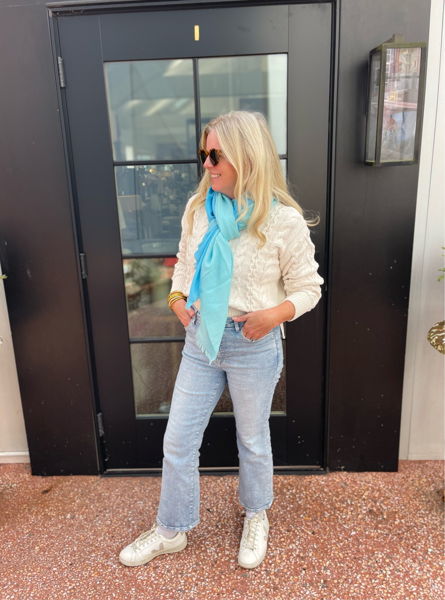 I love this wrap! I am wearing it here as a scarf and it instantly makes my outfit better. Plus keeps me warm on a crisp fall day. I'll be wearing this wrap on the soccer sidelines all fall. It comes in 5 beautiful colors - this one is called Sky Blue. 🩵🩵🩵🩵

#LTKTravel #LTKOver40 #LTKSeasonal