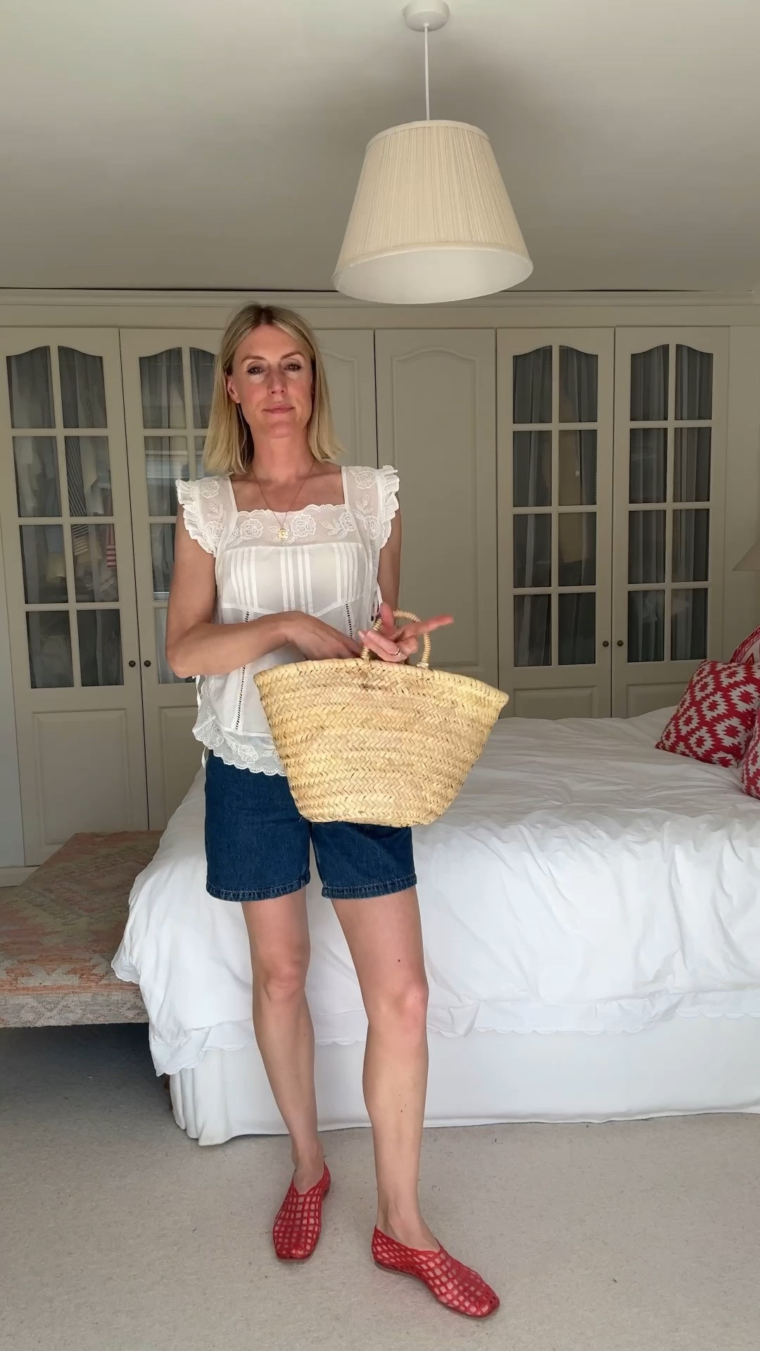 This embroidered cotton top looks designer, feels weightless, and is perfect for the heatwave. I can see why it's trending.

Bib top, embroidered top, long denim shorts, jorts, lace cotton top, cotton top, trending fashion, summer fashion trends, jelly shoes, basket bag, summer outfit ideas, effortless style, fashion over 40, style over 40, summer

#LTKsummer #LTKspring #LTKstyletip