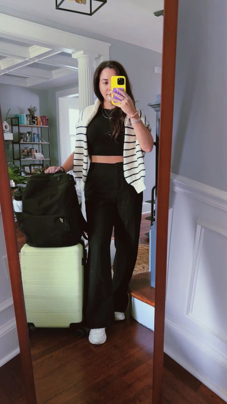a classic travel outfit.
Loose & comfy black pants,  black tee (opting of a crop top) & a warm/bulkier versatile sweater to keep warm on the plane.

Wearing a US 8 in these pants for extra room. 

Travel outfit. Travel style. Monochrome look.

#LTKFind #LTKSeasonal #LTKunder50