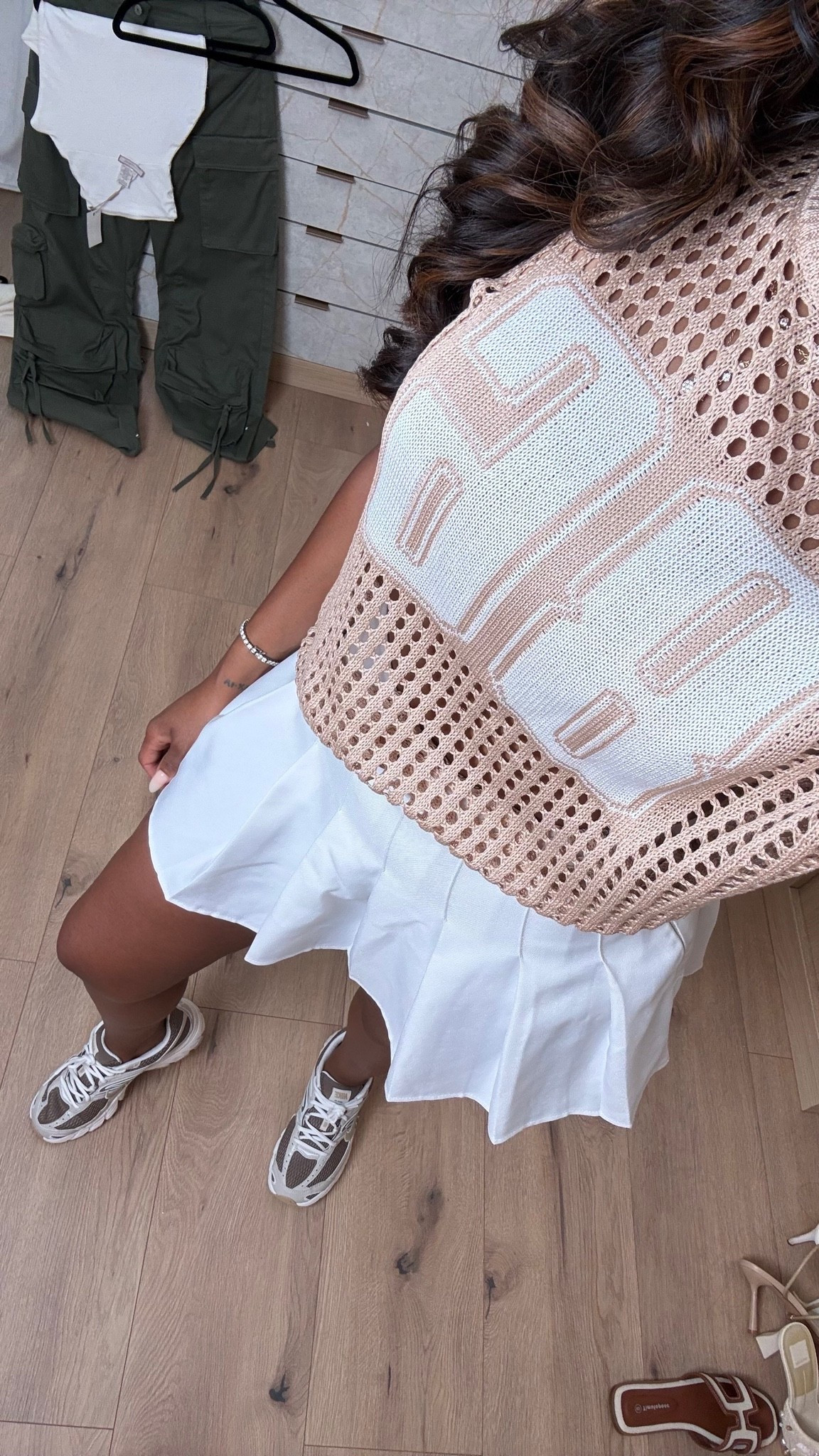 Hi Babes! 🤍✨

Sporty meets chic! This look is one of my favorites for running around while still looking put together. The oversized knit jersey, pleated skirt, and sneakers are the perfect mix of comfy and cute.

Fit Details:
• Exact knit jersey top
• Exact pleated mini skirt
• Exact sneakers
• Exact quilted bag
• True to size

Where to wear:
• Weekend errands
• Brunch
• Shopping
• Travel days
• Casual lunch dates

Everything is linked below!

xx, Kira | IG: KirasFashionFinds

Measurements:
Kira: 5'4" | Size Small | 140 lbs