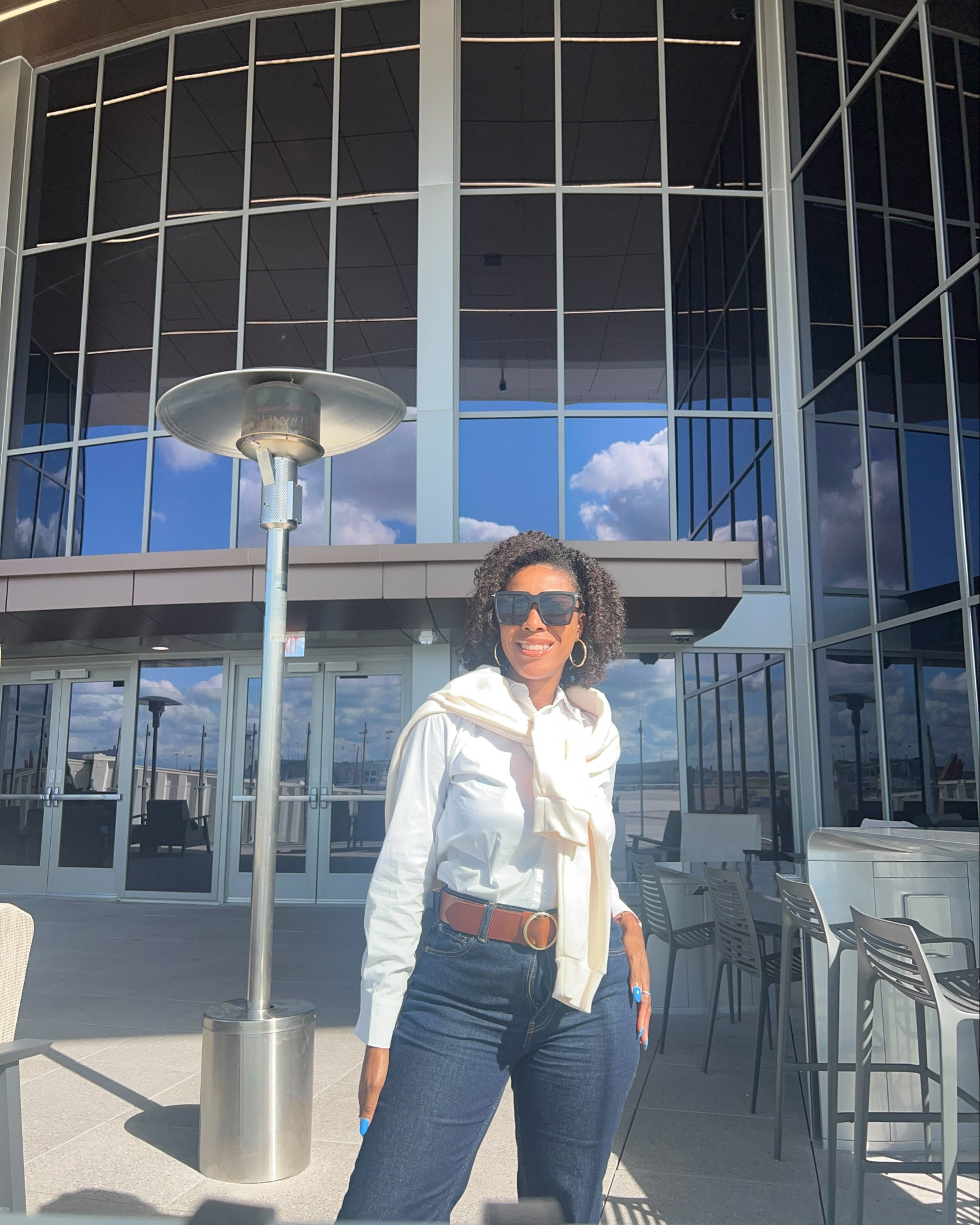 ✈️ Airport Outfit Ready! Traveling to DC in a classic white button-up, dark denim jeans, cozy crewneck sweatshirt + dressy sneakers — comfy but polished so I can hit the ground running. Perfect mix of travel style, casual chic, and airport outfit inspo. 

#LTKPetite #LTKTravel #LTKOver40