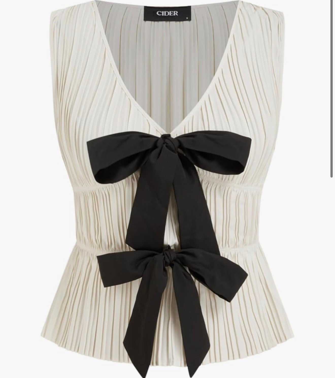 Cider bow top 

#cider #bow #blackandwhite #datenight 

#LTKootd #LTKWorkwear #LTKgrwm
