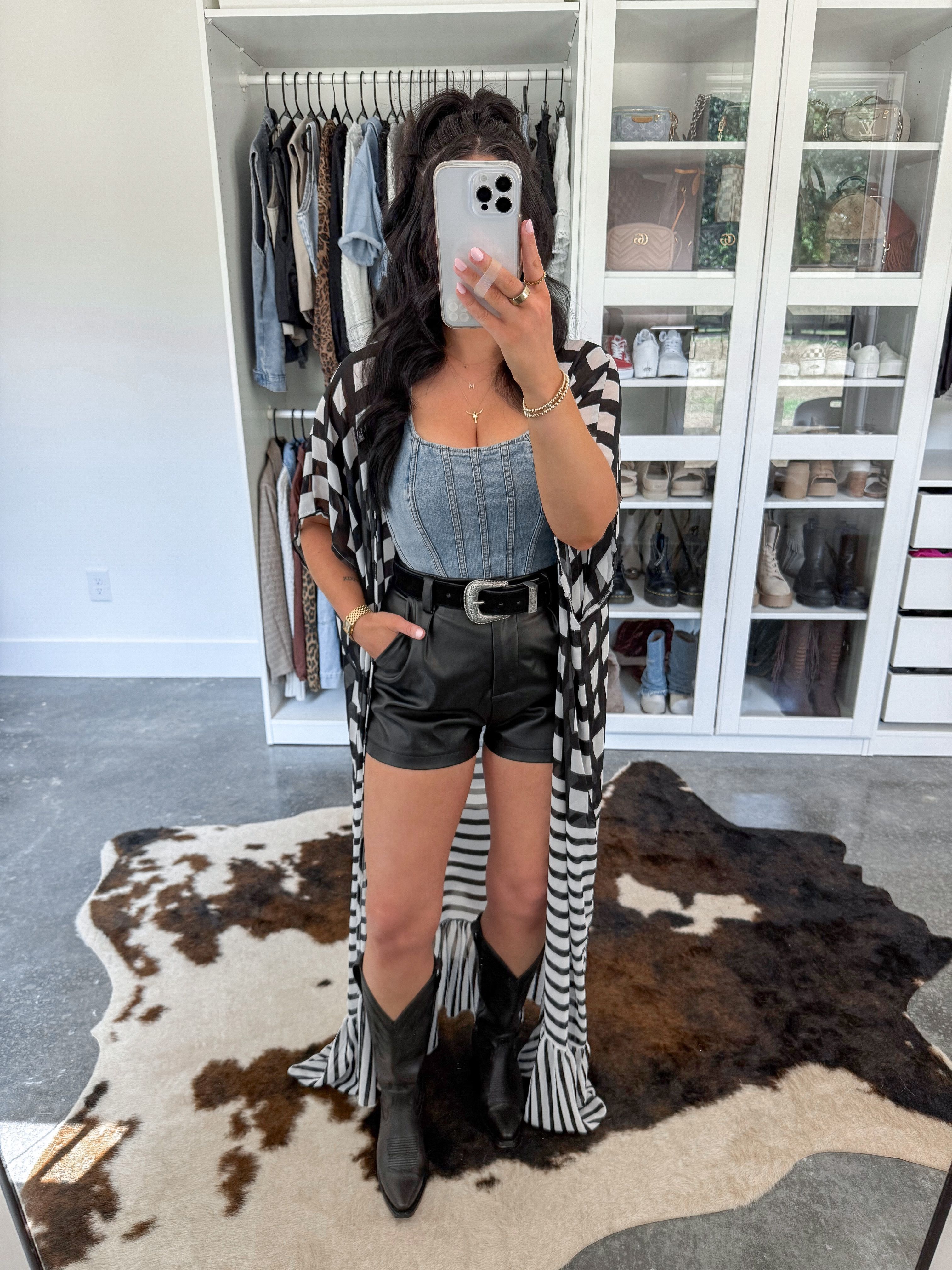Denim Top - small
Shorts - small
Belt - small

There is no better combo than leather & denim! 👏🏼 I love this denim corset top (it has good stretch!) paired with these leather shorts! I added my go-to black suede western belt & this black and white kimono! Finished the look with my black cowgirl boots for a chic edgy western look. 🖤

 

 #LTKFindsUnder50 #LTKFindsUnder100 #LTKStyleTip