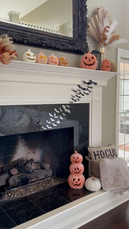 Falloween fireplace 2023 🎃🍂 #halloweeninspo Do you decorate your fireplace for Halloween or just fall? I’m loving these reflective bats this year! All the terracotta pumpkins are plastic and I painted them myself. Linking all fall and spooky decor in the @shop.ltk app and there is a reel for this DIY fall mantle decor! 

#terracottapumpkins #diydecor #diyhalloween #batdecor #batdecorations #halloweenfireplace #mantledecor #jackolantern #spookyseason #spookydecor #spooky #pumpkindecor #diypumpkin #terracotta #halloween2023 

#LTKSeasonal #LTKhome #LTKHalloween