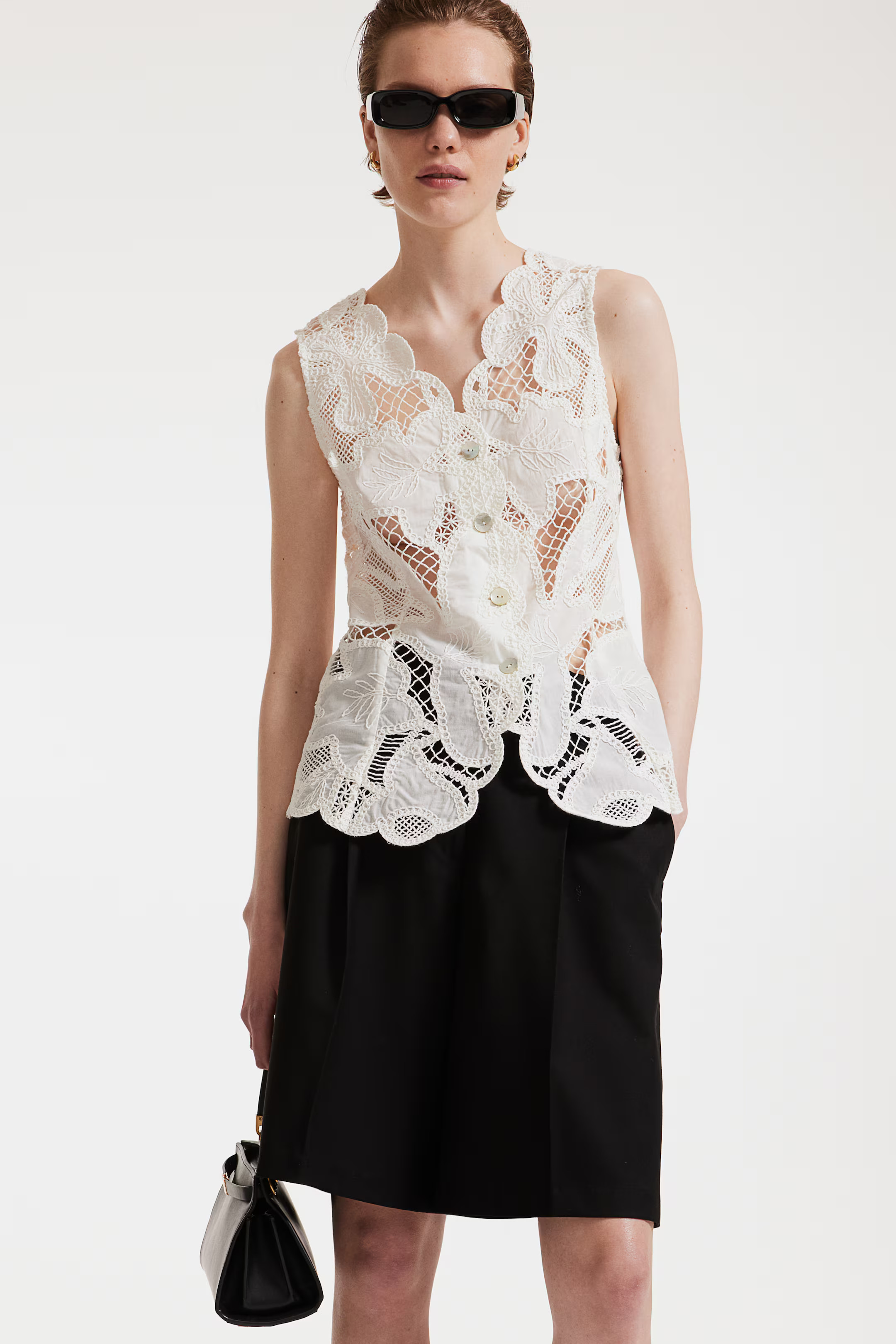 Chaleco en bordado inglés - Escote de pico - Sin mangas - Blanco - MUJER | H&M ES | H&M (FR, IT, ES, PT, BE)