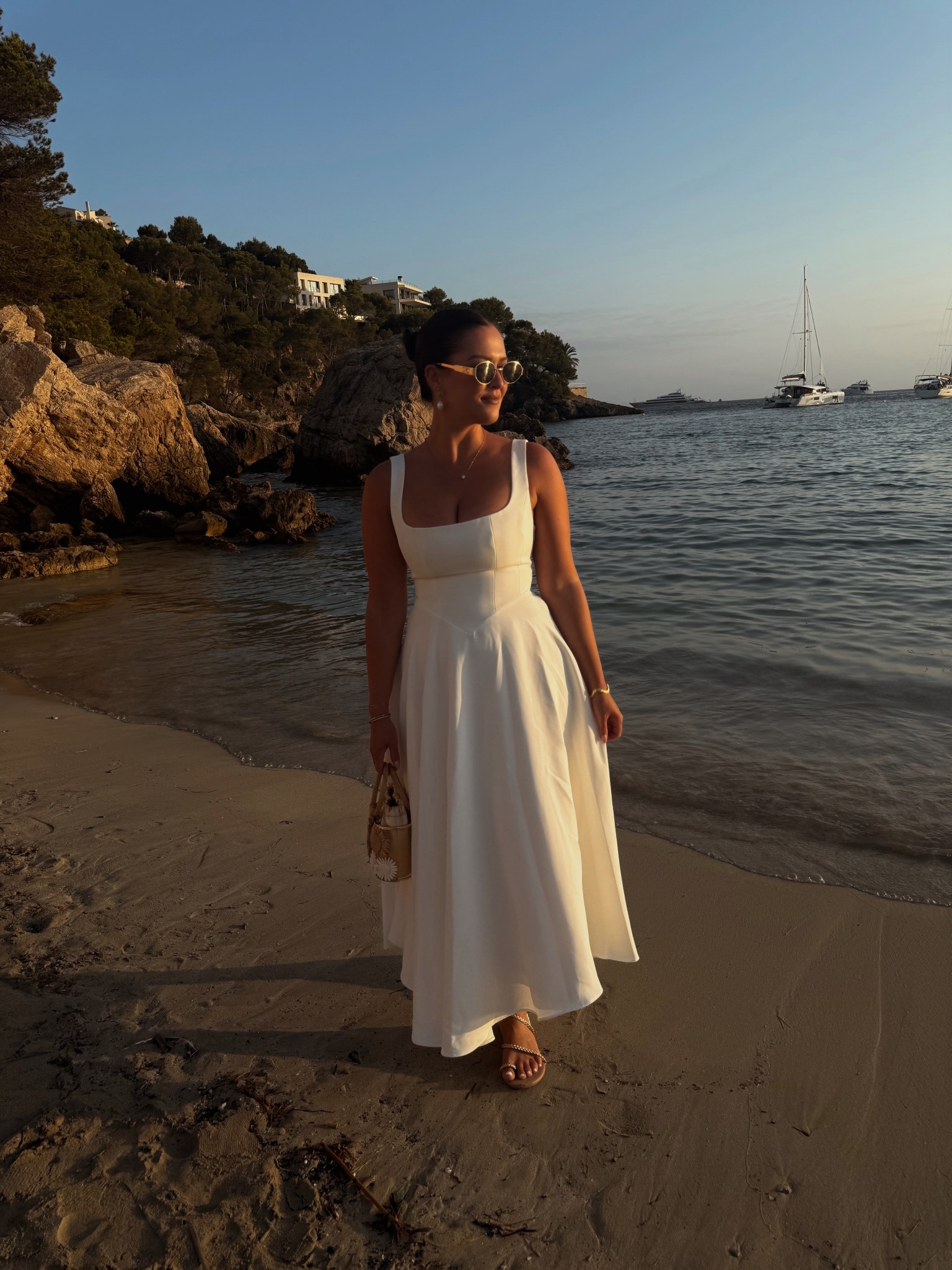 Saving the white dress for your last night on holiday, always 🤍

Wearing a size small in the dress, shoes are Friends like these at Next, Bag is River Island 

#LTKeurope #LTKdatenight #LTKsummer
