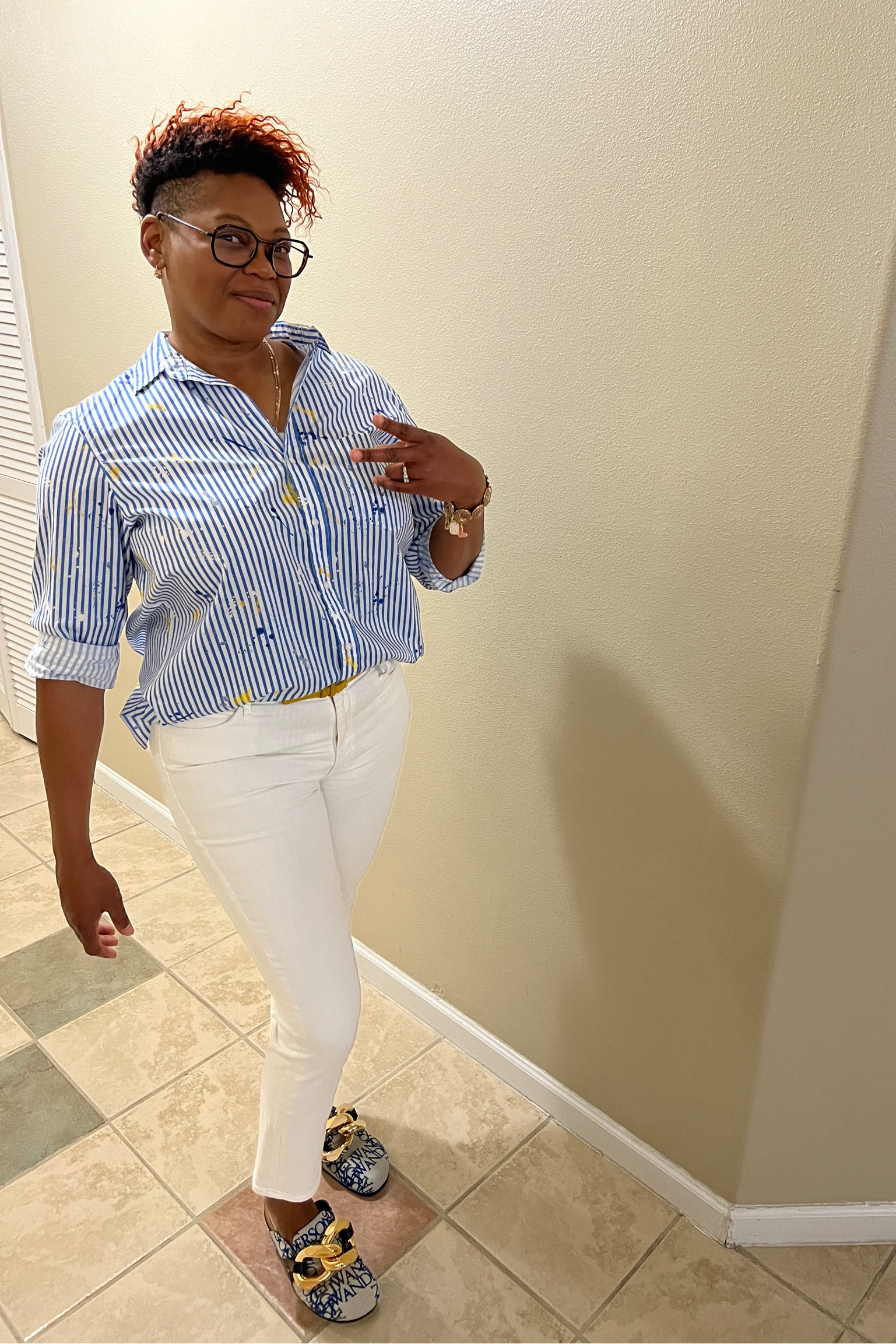 Similar apparel is below. Here I am wearing a Painted stripe shirt by Kerri Rosenthal, Mules by J.W. Anderson, Mother Denim, trying together with a yellow thin suede belt.

#LTKshoecrush #LTKFind