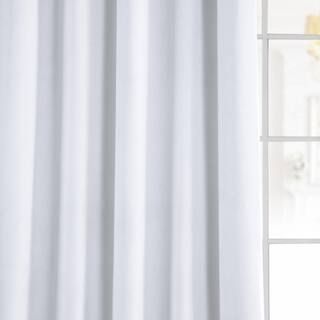 Signature Primary White Solid Velvet 50 in. W x 120 in. L Rod Pocket Blackout Curtain (1 Panel) | The Home Depot